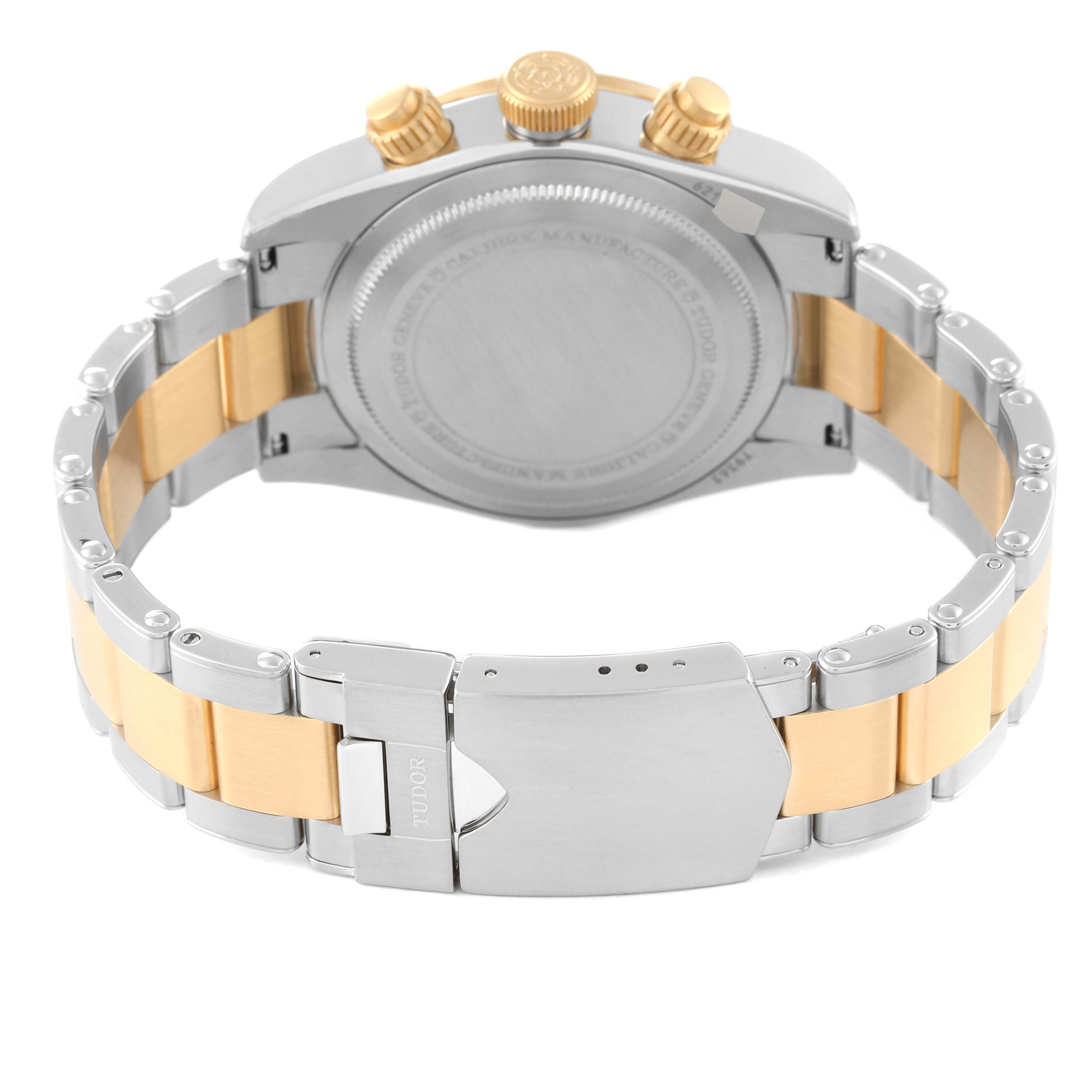 The image shows the back view of a Tudor Heritage Black Bay 79363N Men
s Steel and Gold (two tone) Black Dial 79363N Men
s Steel and Gold (two tone) Black Dial watch, highlighting the stainless steel and gold-tone bracelet and clasp.