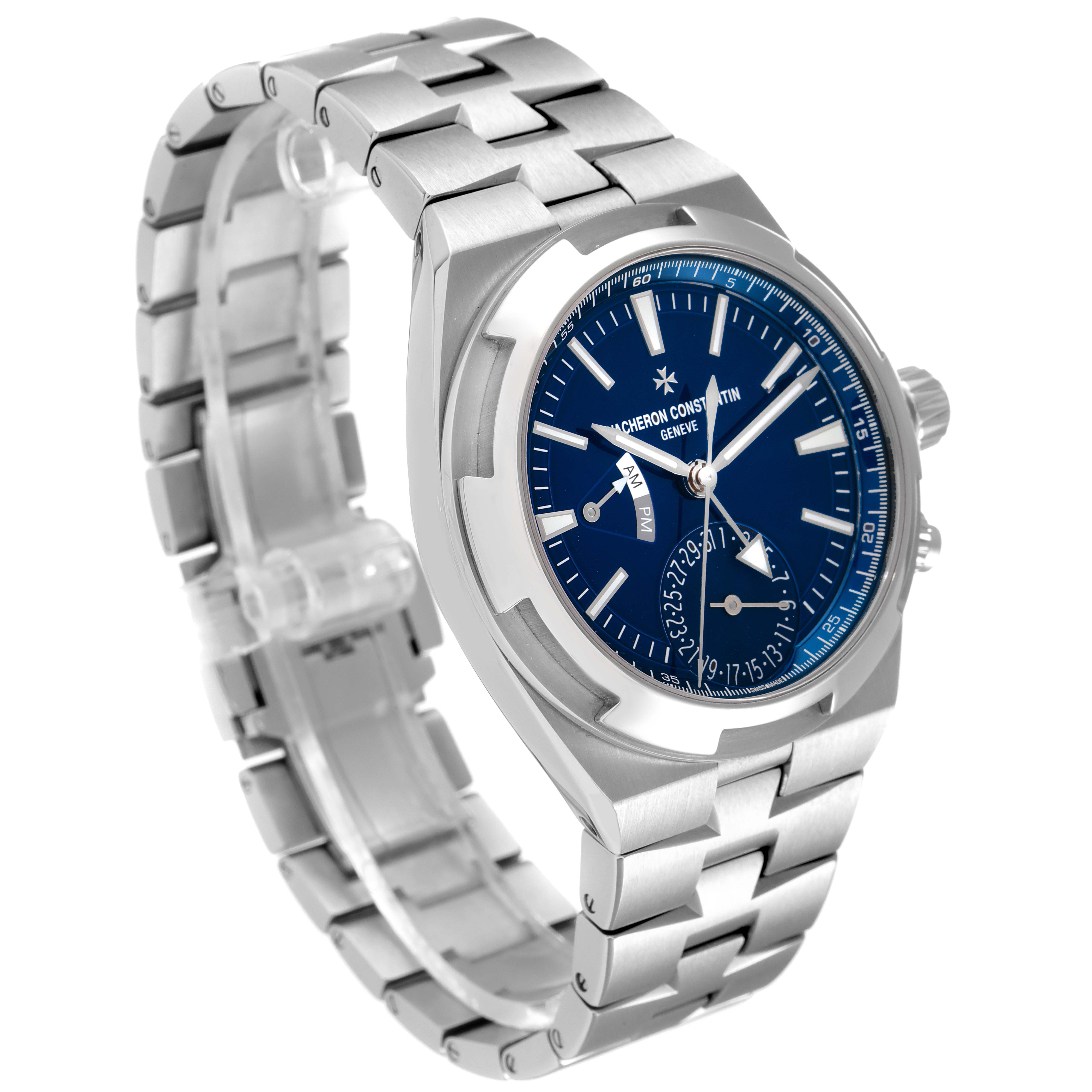 The Vacheron Constantin Overseas 7900V/110A-B334 Men's Stainless Steel Blue Dial 7900V/110A-B334 Men's Stainless Steel Blue Dial watch is shown at a three-quarter angle, highlighting the blue dial and metal bracelet.