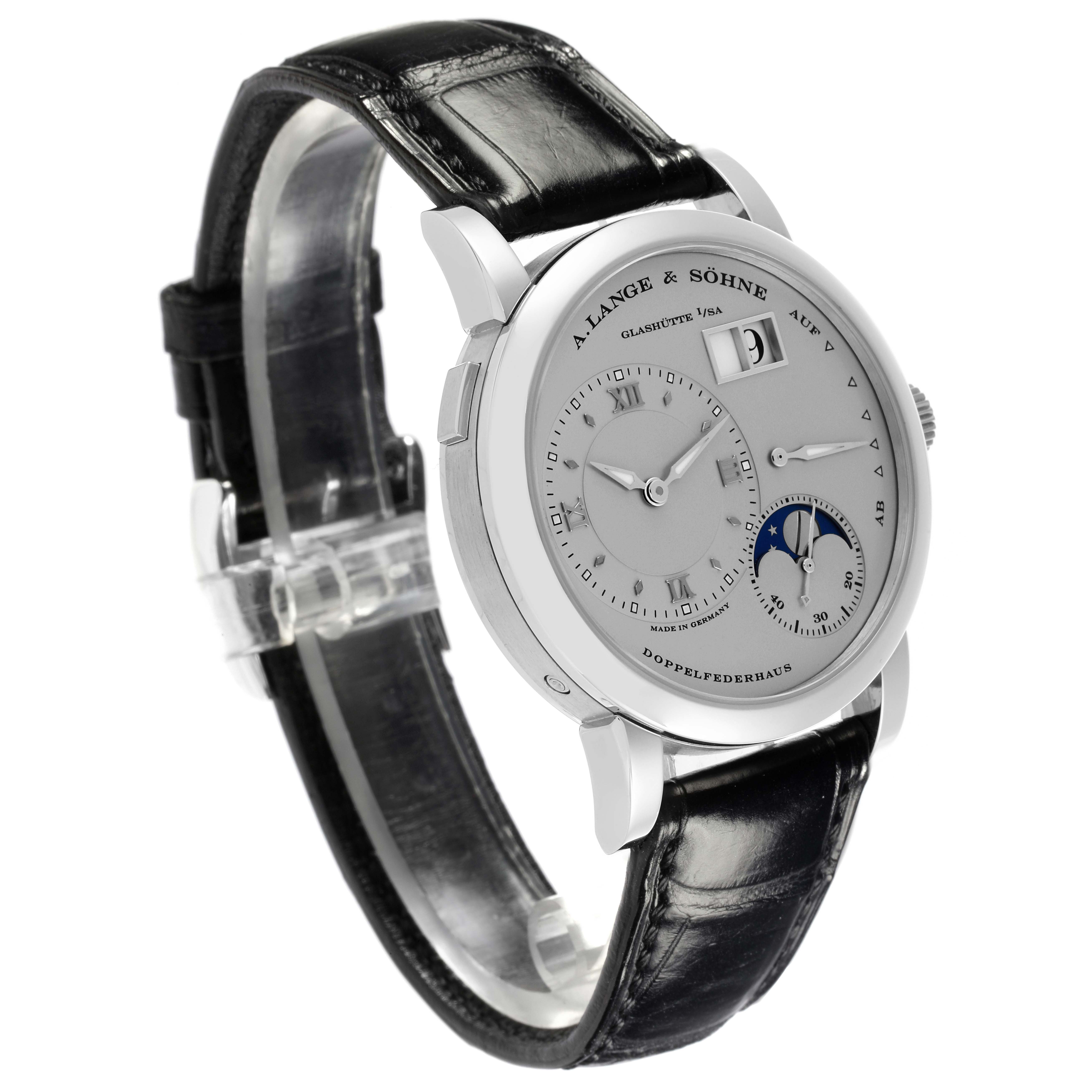 The A. Lange & Sohne Lange 1 109.025 Men's Platinum Silver Dial watch is shown from a three-quarter front angle, displaying the dial, case, and leather strap.