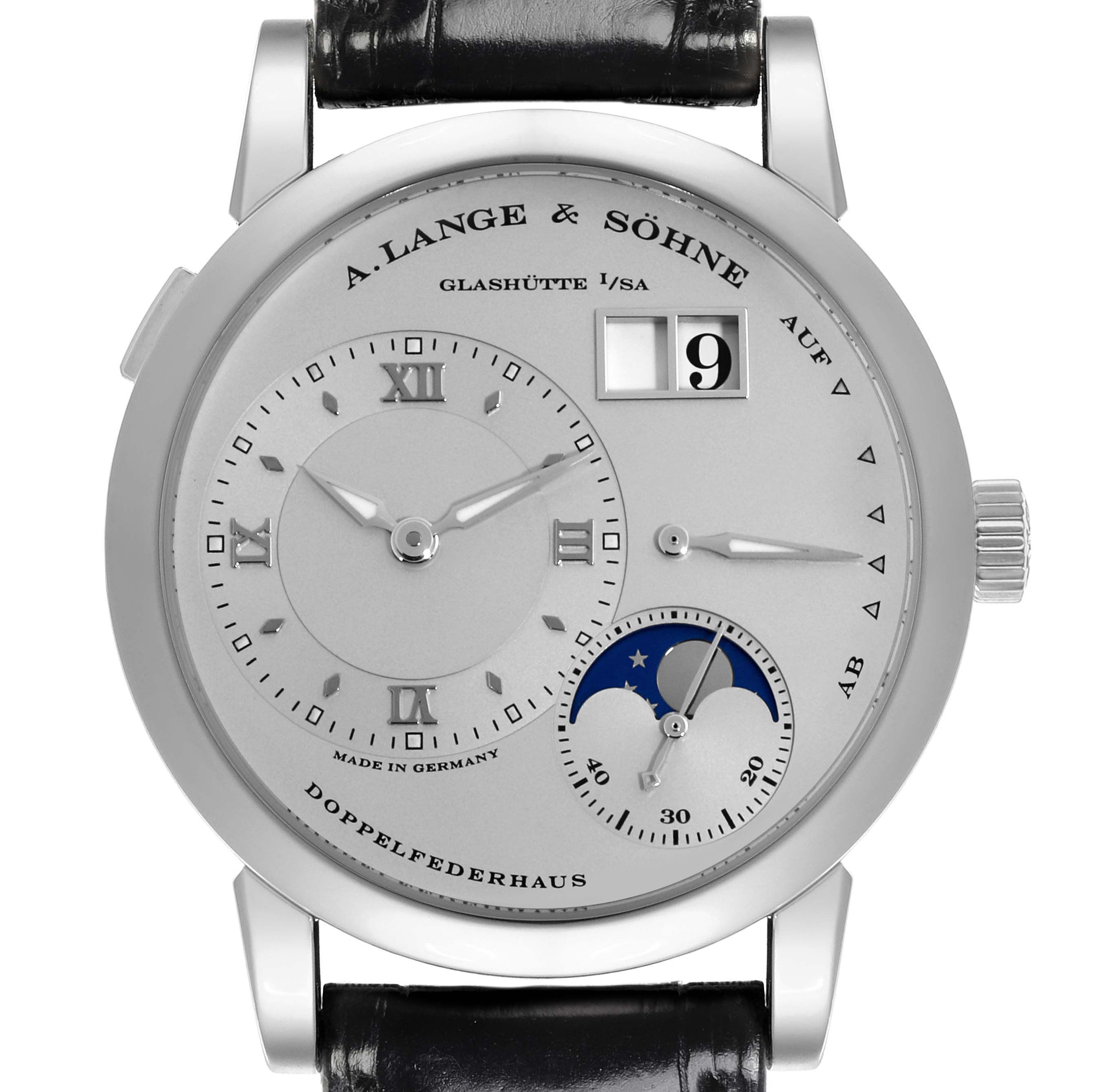The image shows a front view of the A. Lange & Sohne Lange 1 109.025 Men's Platinum Silver Dial watch, highlighting its dial, hands, date display, and moon phase.