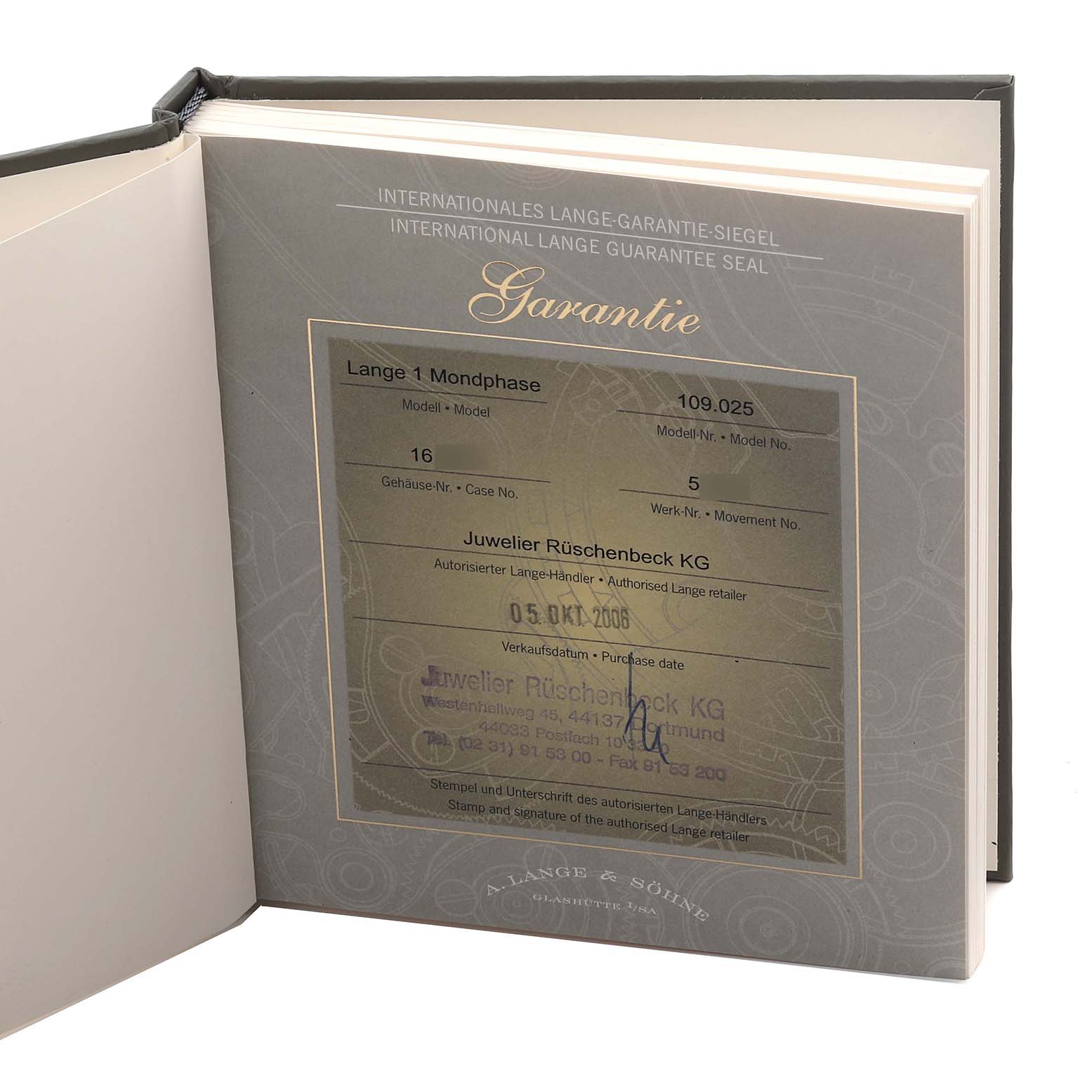 The image shows a warranty booklet for the Lange 1 model by A. Lange & Söhne.