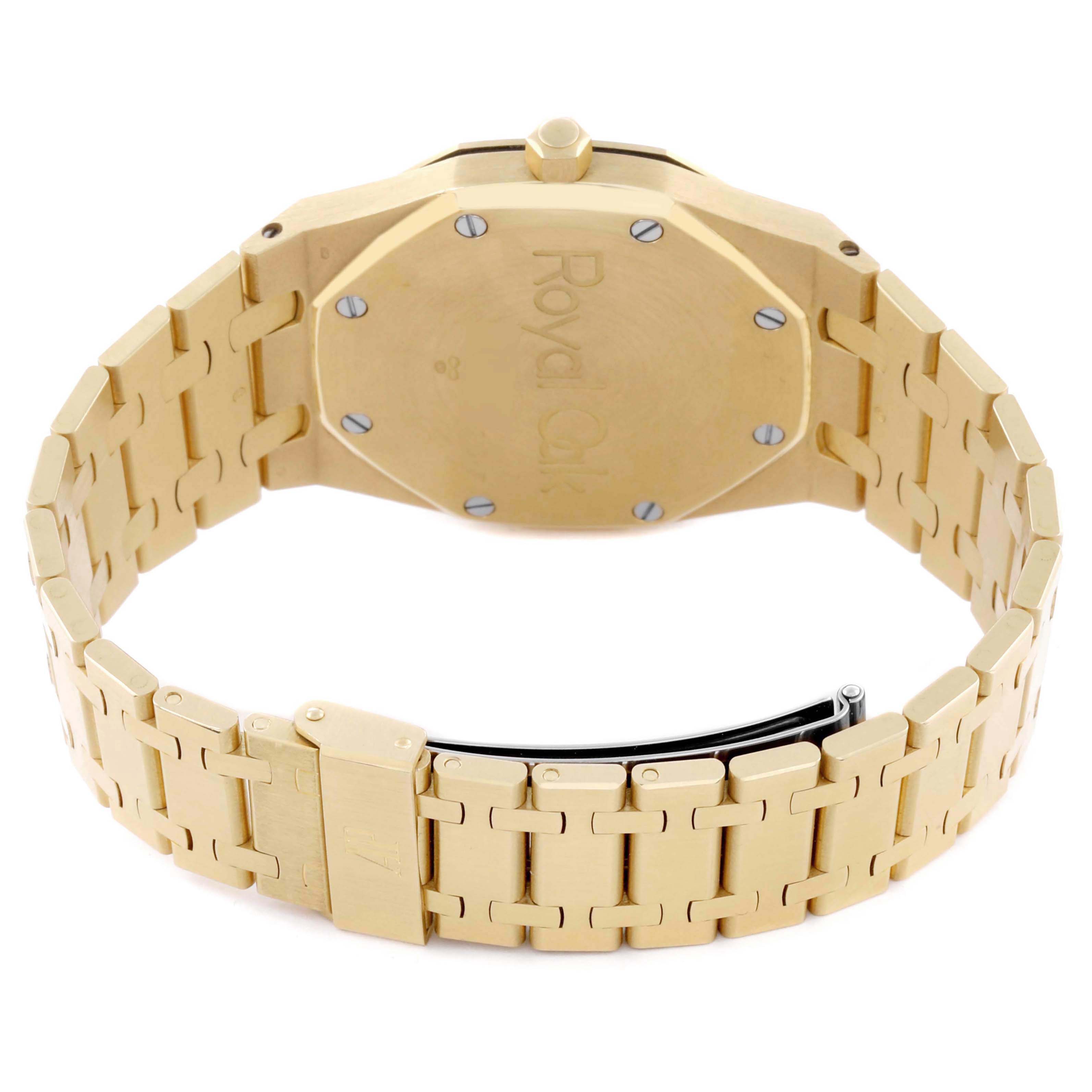 The image shows the back of the Audemars Piguet Royal Oak 5402BA-001 Men's Yellow Gold Grey Dial watch, highlighting its bracelet and clasp from a rear angle.