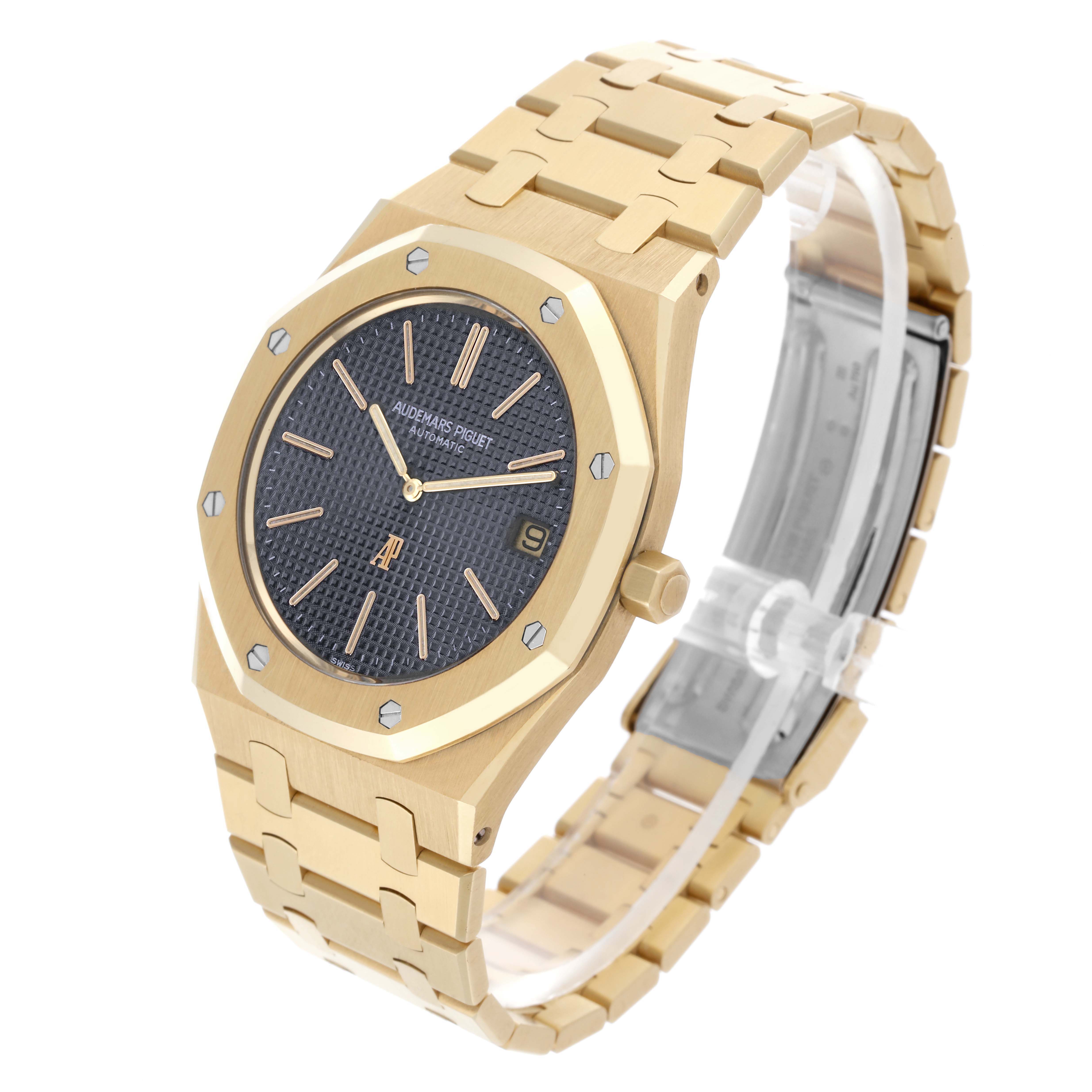 The Audemars Piguet Royal Oak 5402BA-001 Men's Yellow Gold Grey Dial watch is shown from a three-quarter angle, displaying the face, bezel, crown, and bracelet.