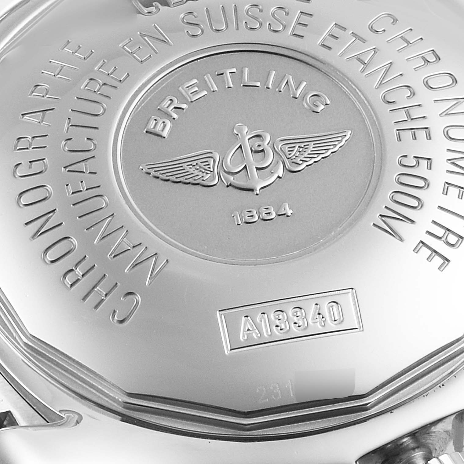 Close-up of the back case of a Breitling Superocean A13340 Men's Stainless Steel Blue Dial A13340 Men's Stainless Steel Blue Dial watch, displaying the engraving and model number.