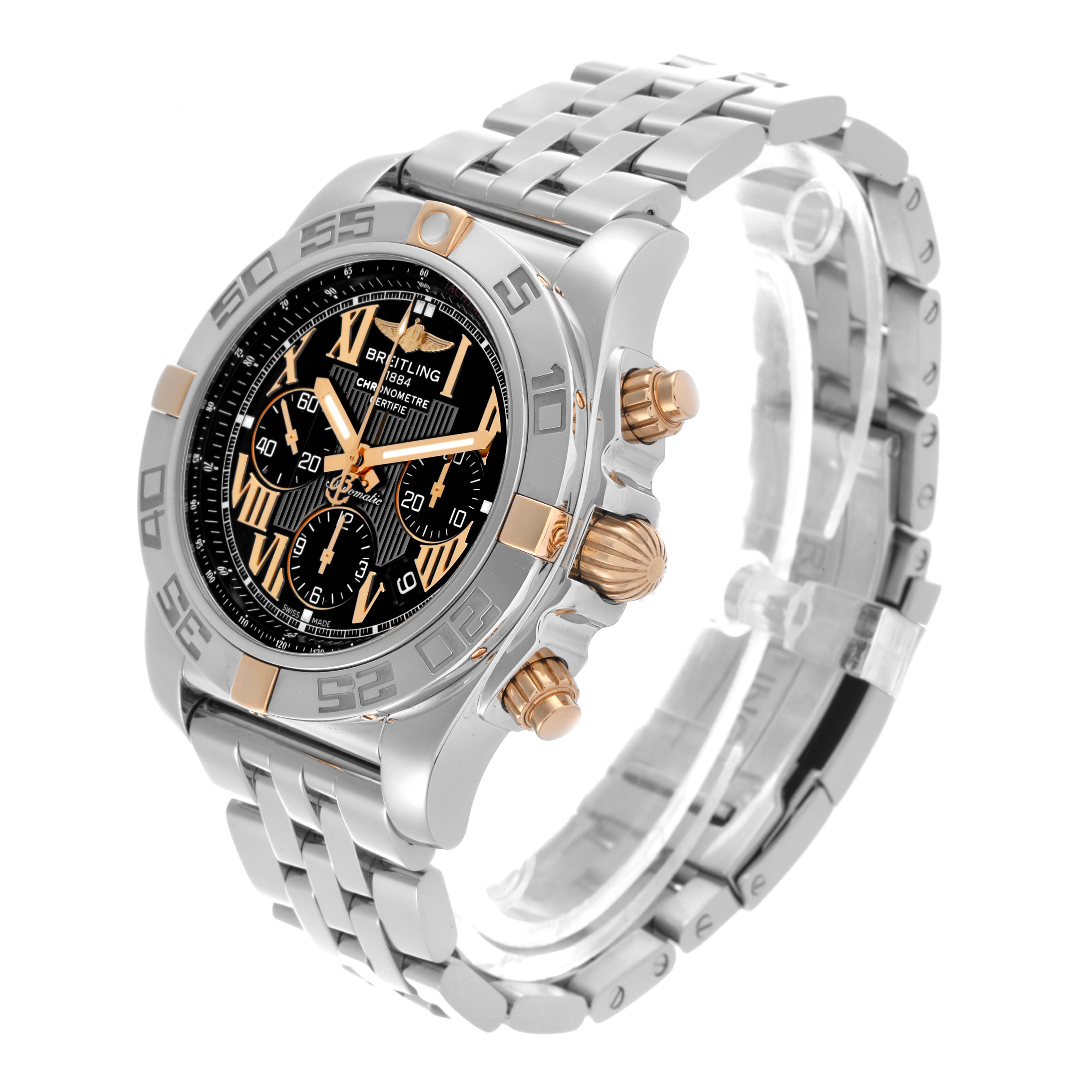 The Breitling Chronomat IB0110 Men's Steel and Gold (two tone) Black Dial IB0110 Men's Steel and Gold (two tone) Black Dial watch is shown at a side angle, highlighting the face, bezel, crown, and partial bracelet.