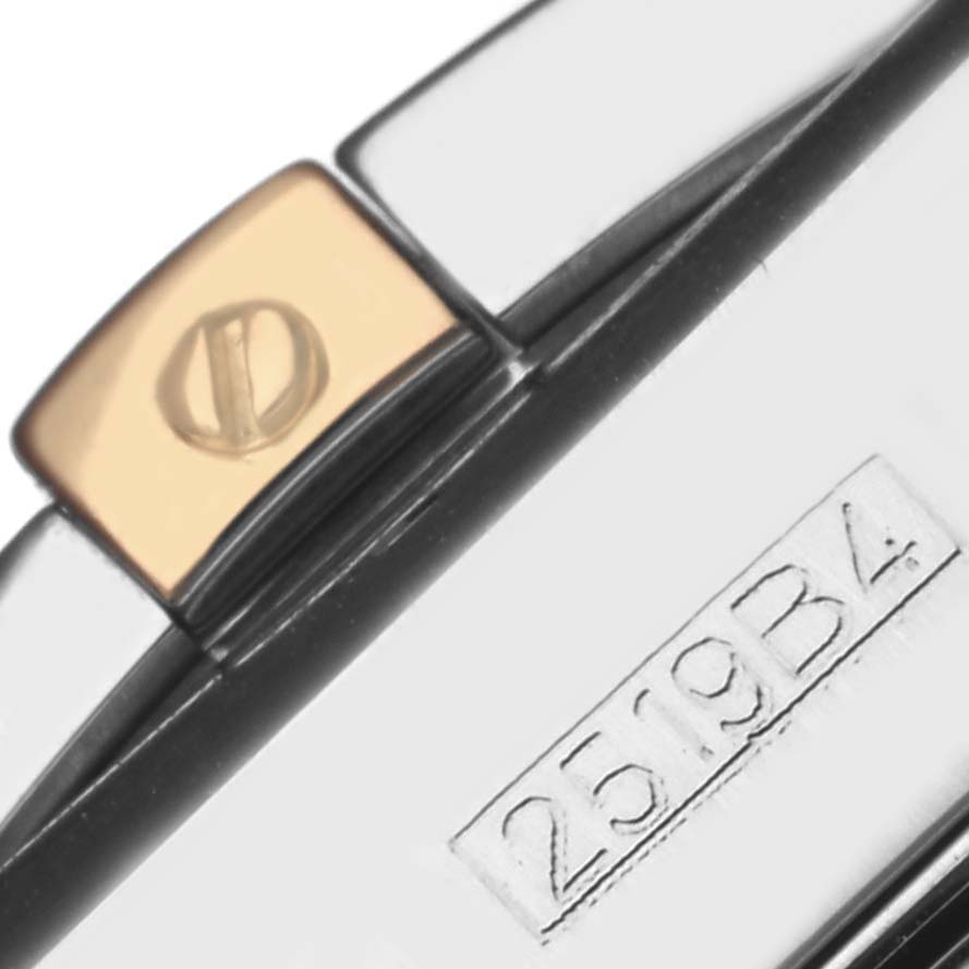 The image shows a close-up of the clasp and engraved part of a Breitling Chronomat IB0110 Men's Steel and Gold (two tone) Black Dial IB0110 Men's Steel and Gold (two tone) Black Dial watch.