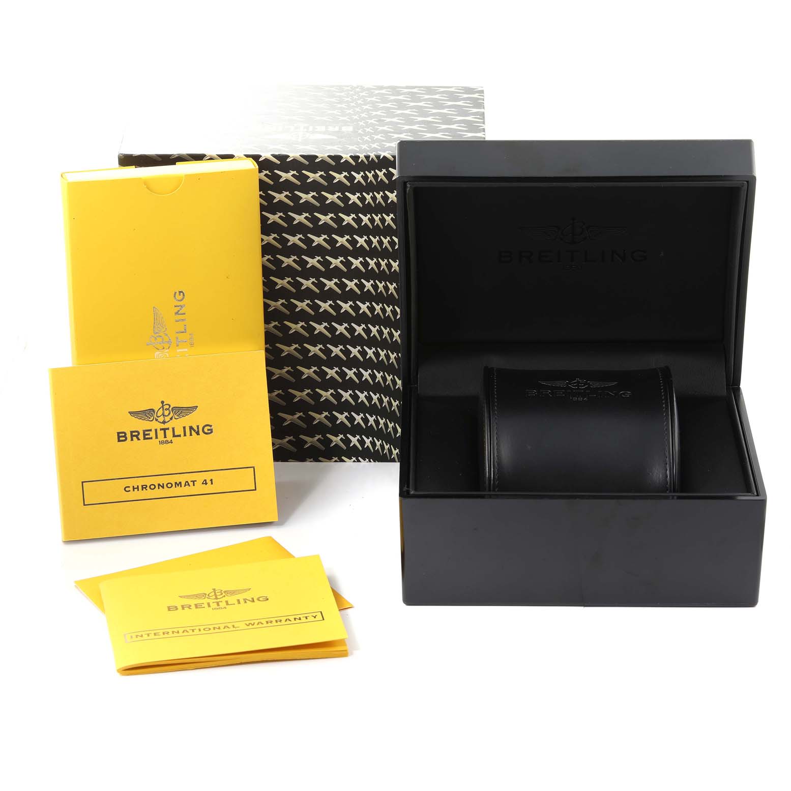 The image shows the packaging and accessories of a Breitling Chronomat AB0140 Men's Stainless Steel Mother of Pearl Dial AB0140 Men's Stainless Steel Mother of Pearl Dial 41 watch, including the box, manual, and warranty card.