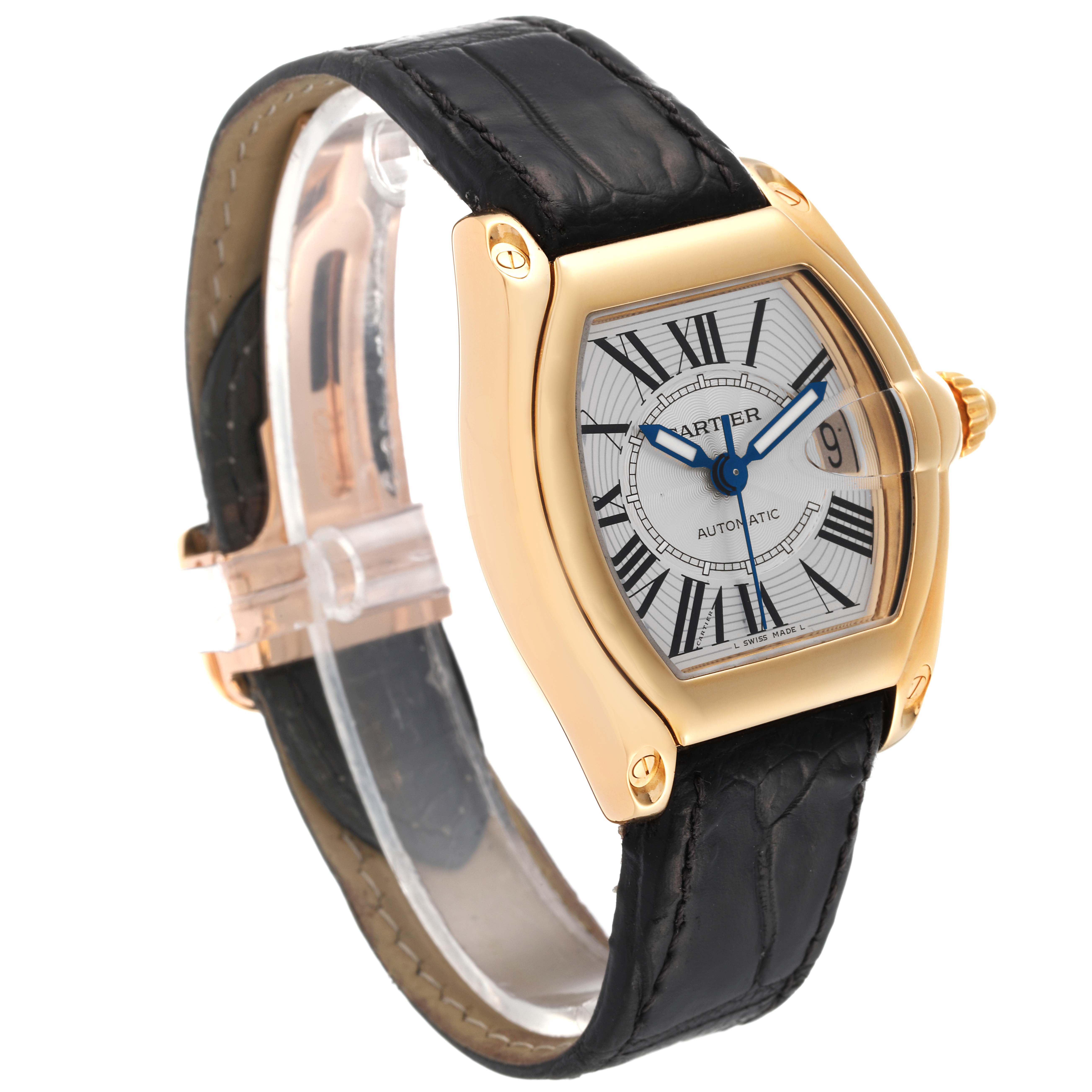 This image shows a Cartier Roadster W62005V2 Men's Yellow Gold Silver Dial W62005V2 Men's Yellow Gold Silver Dial watch from a front-side angle, displaying the dial, case, and black leather strap.