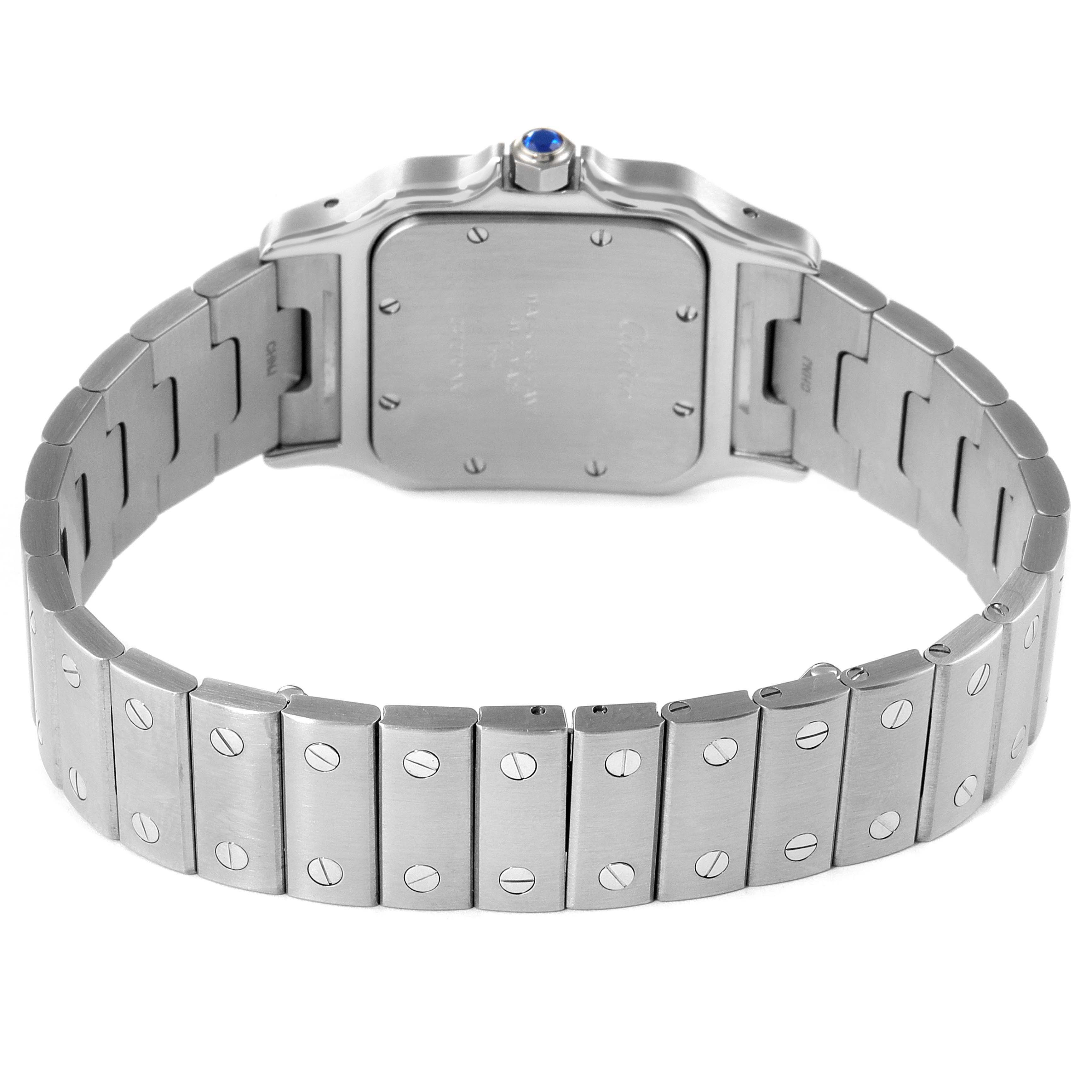 The image shows the back view of a Cartier Santos W20060D6 Men's Stainless Steel Silver Dial W20060D6 Men's Stainless Steel Silver Dial model watch, highlighting its stainless steel bracelet and case back.
