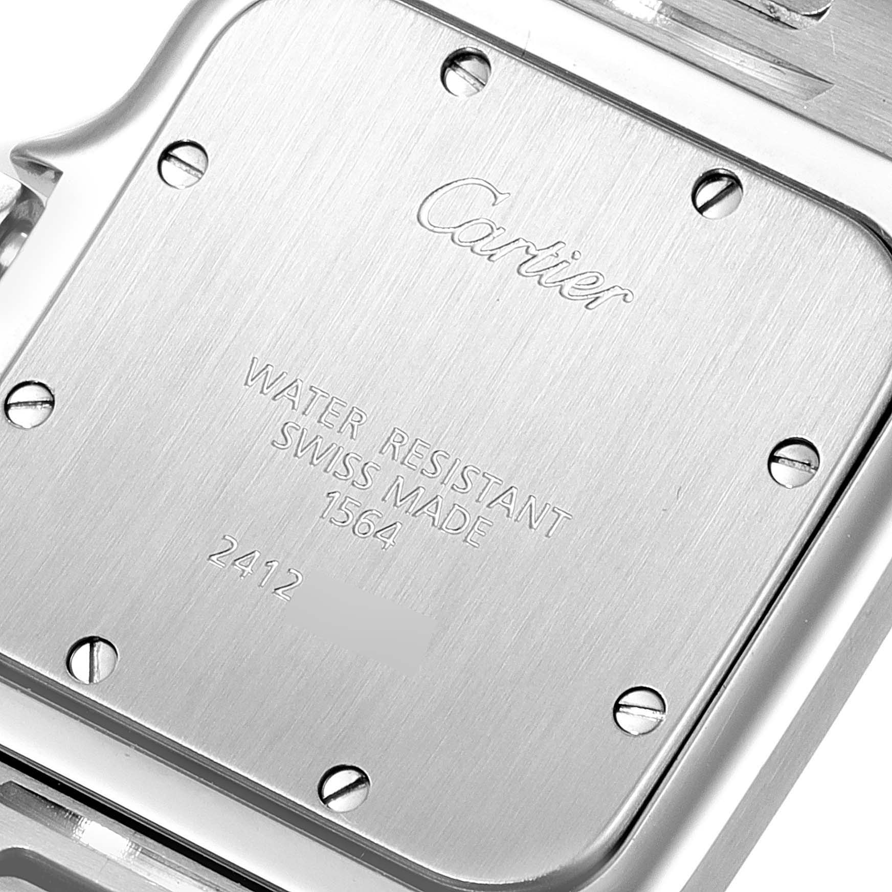 The image shows the back case of a Santos model by Cartier, displaying water resistance and other specifications.
