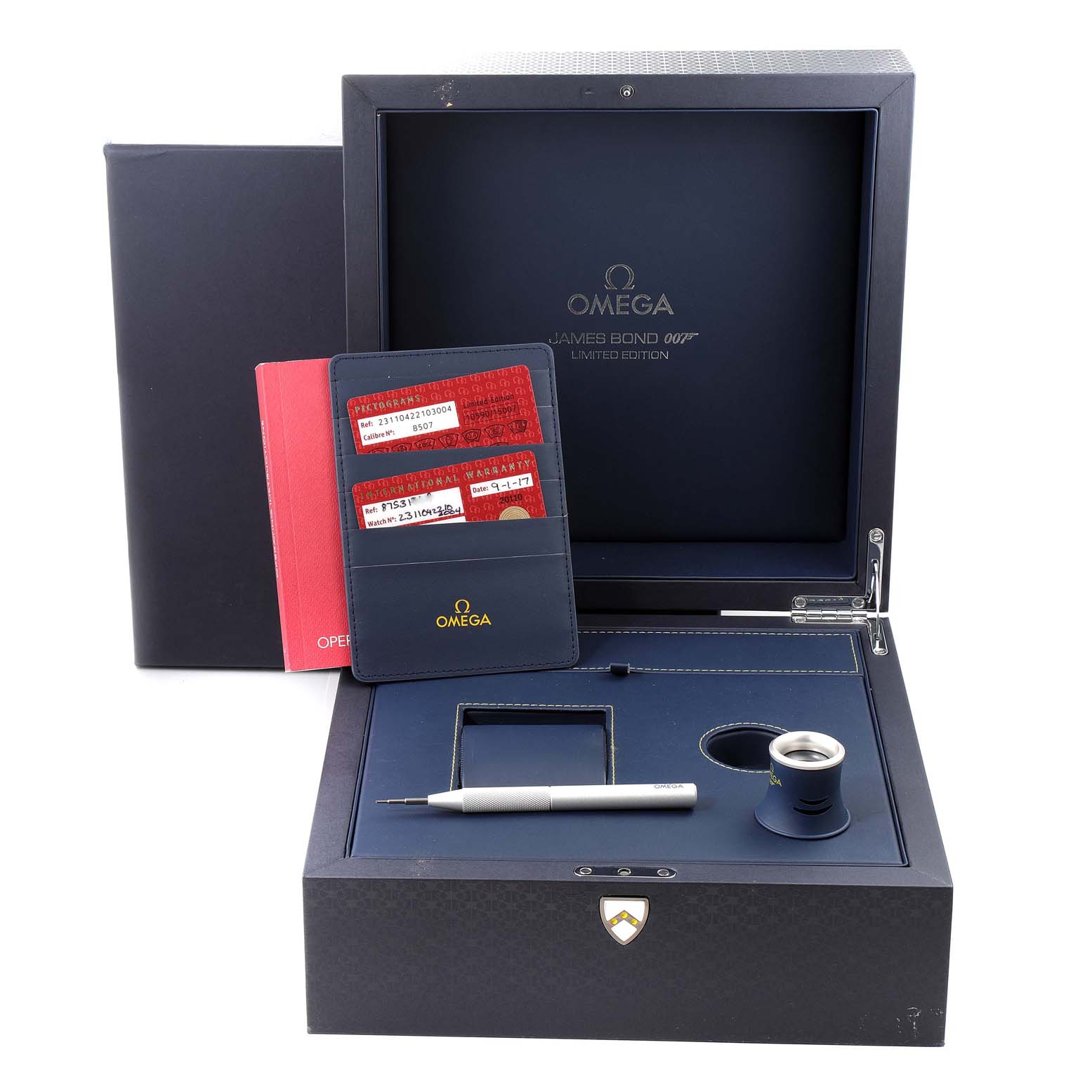 The image shows the packaging and accessories for the Omega Aqua Terra 231.10.42.21.03.004 Men's Stainless Steel Blue Dial 231.10.42.21.03.004 Men's Stainless Steel Blue Dial watch, including a box, tool, documentation, and loupe.