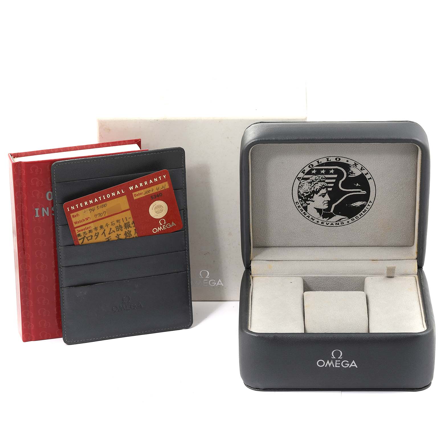 The image shows Omega Speedmaster 3574.51.00 Men's Stainless Steel Black Dial 3574.51.00 Men's Stainless Steel Black Dial accessories, including the box, warranty cardholder, and instruction manual.