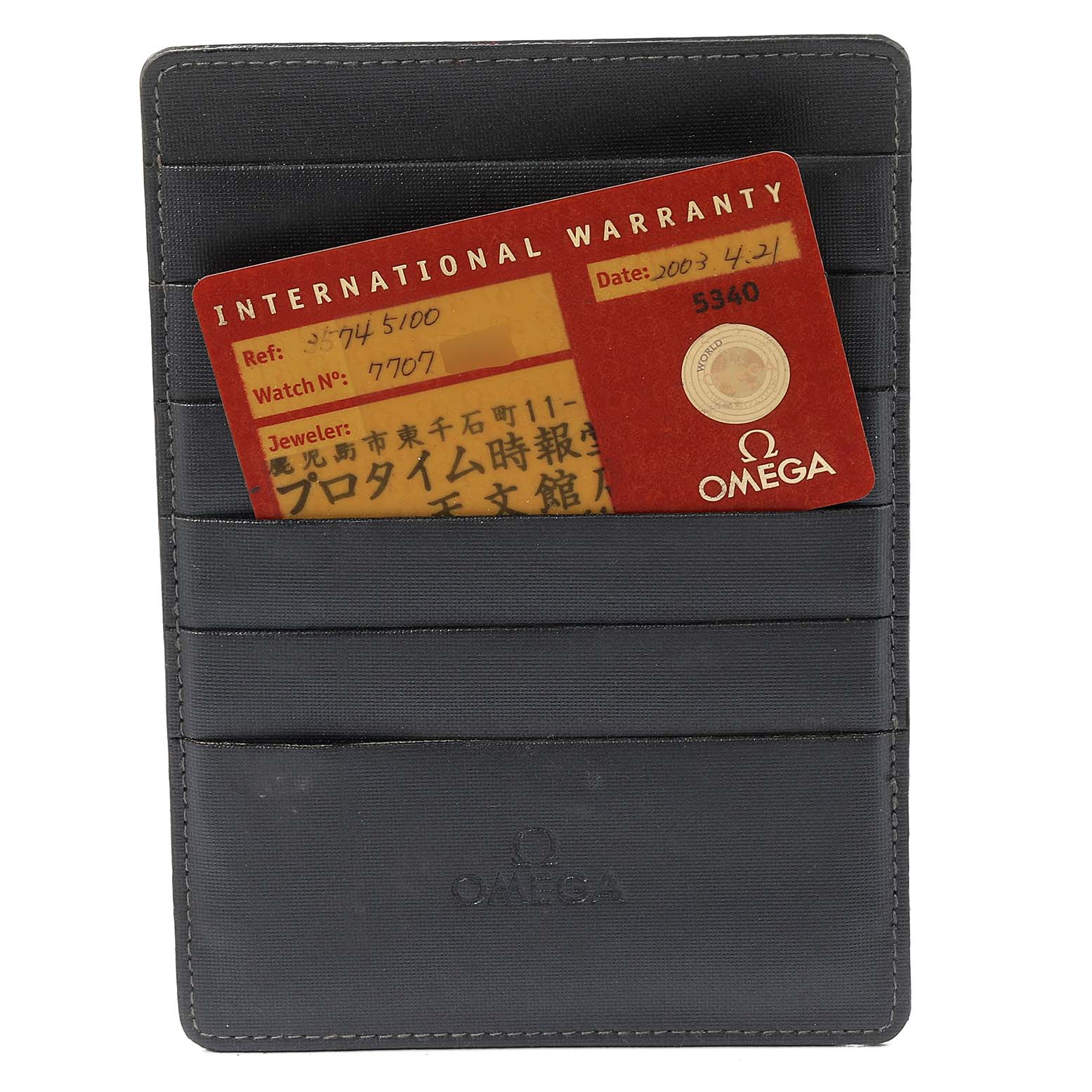 The image shows an Omega Speedmaster 3574.51.00 Men's Stainless Steel Black Dial 3574.51.00 Men's Stainless Steel Black Dial's international warranty card in a black Omega-branded holder.