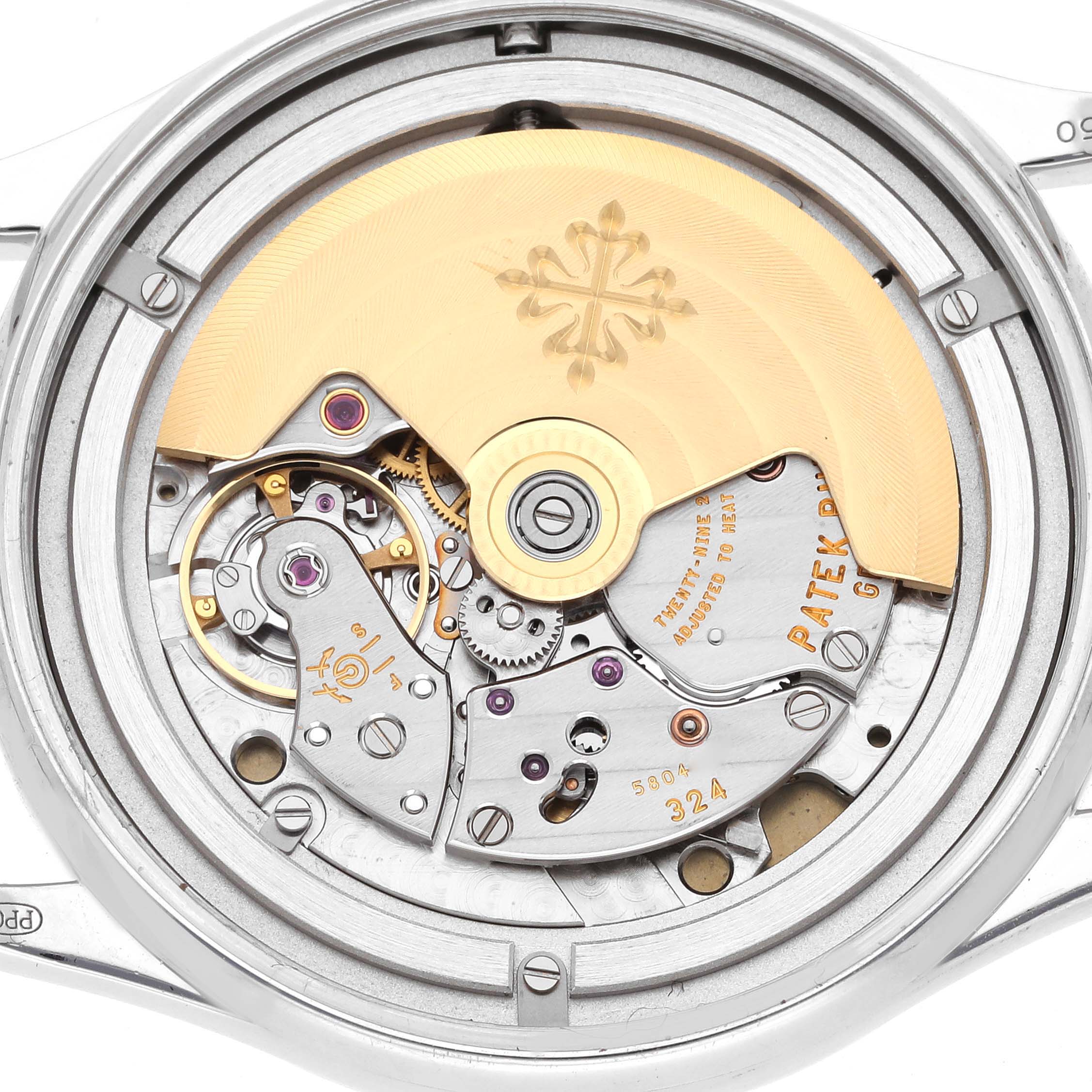 The image shows the intricate internal movement of a Patek Philippe Calatrava 5297G-001 Men's White Gold Black Dial 5297G-001 Men's White Gold Black Dial watch from a backside view.