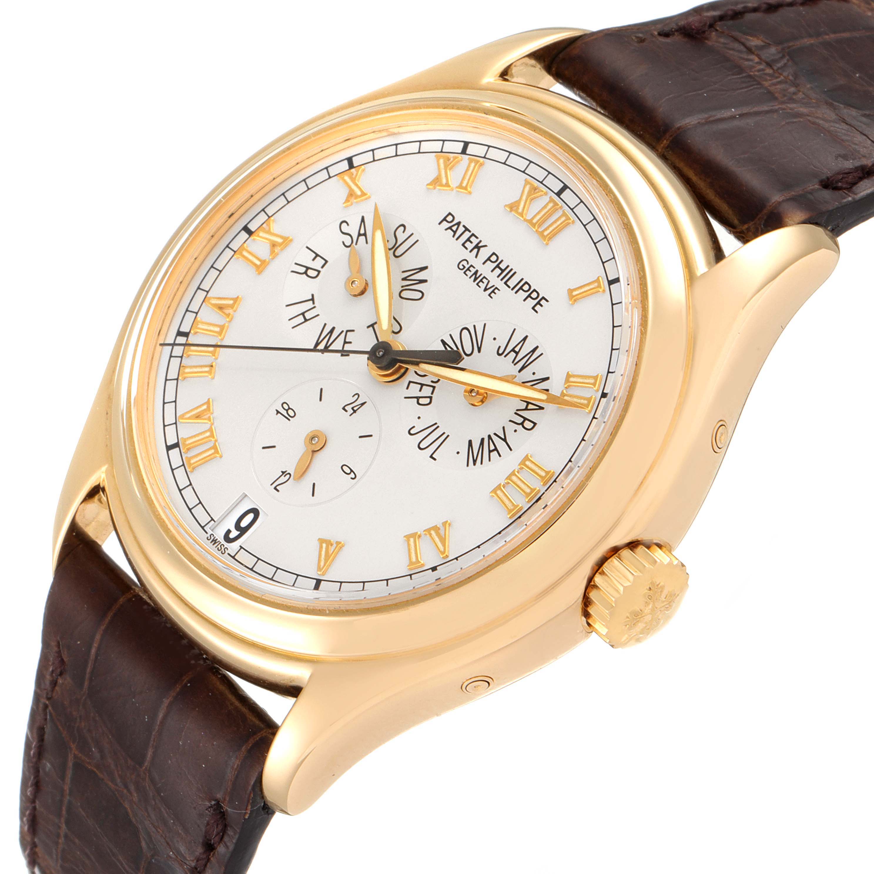 The image shows a Patek Philippe Complications 5035G Men's Yellow Gold Silver Dial 5035G Men's Yellow Gold Silver Dial watch angled to display the dial, crown, and leather strap.