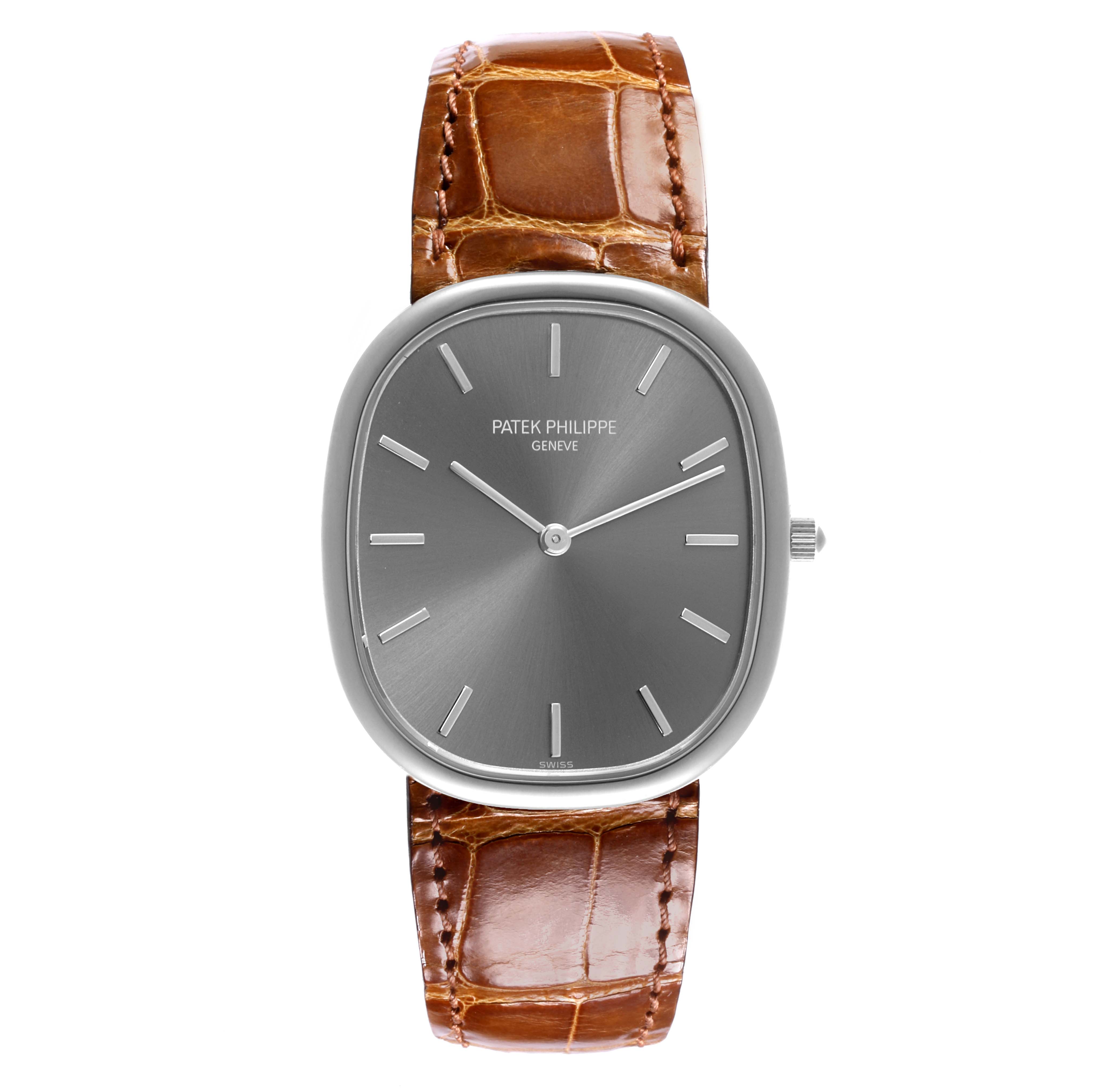 The Patek Philippe Golden Ellipse 3738/100G Men's White Gold Grey Dial 3738/100G Men's White Gold Grey Dial watch is shown from the front, displaying the face and brown leather strap.