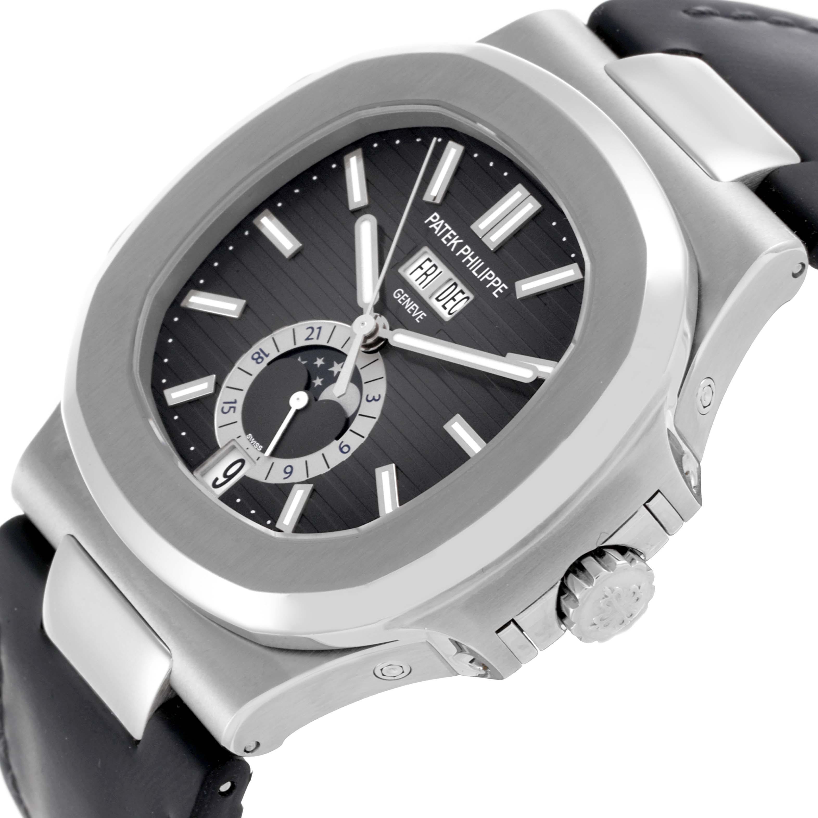 The Patek Philippe Nautilus 5726A-001 Men's Stainless Steel Black Dial 5726A-001 Men's Stainless Steel Black Dial watch is shown at an angled view, highlighting the dial, case, and crown.