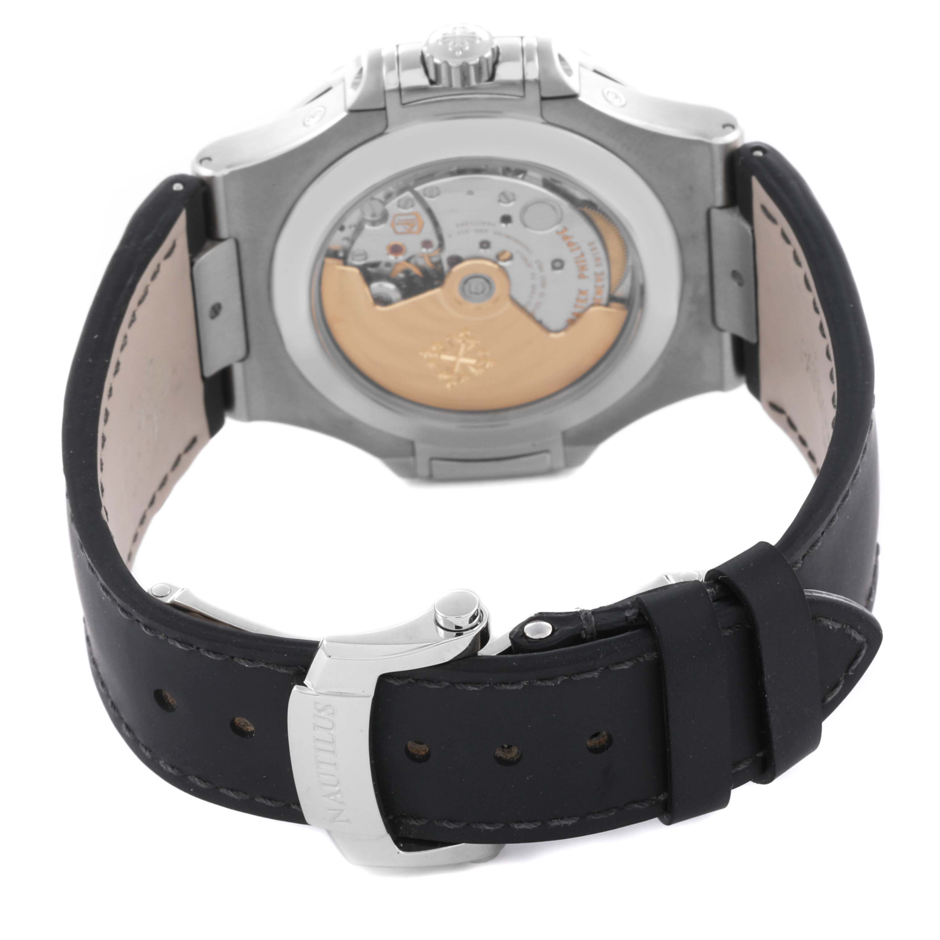 The image shows the back of the Patek Philippe Nautilus 5726A-001 Men's Stainless Steel Black Dial 5726A-001 Men's Stainless Steel Black Dial watch, highlighting the movement and deployment clasp with branding.