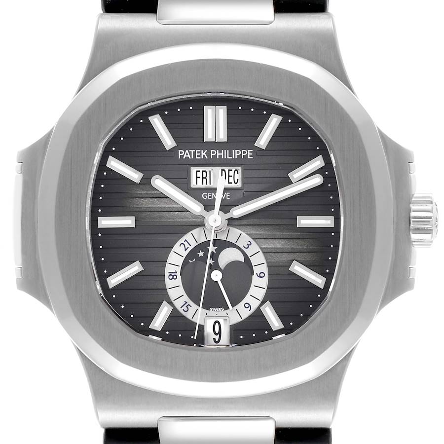 The Patek Philippe Nautilus watch is shown from the front, featuring the dial, hands, and crown.