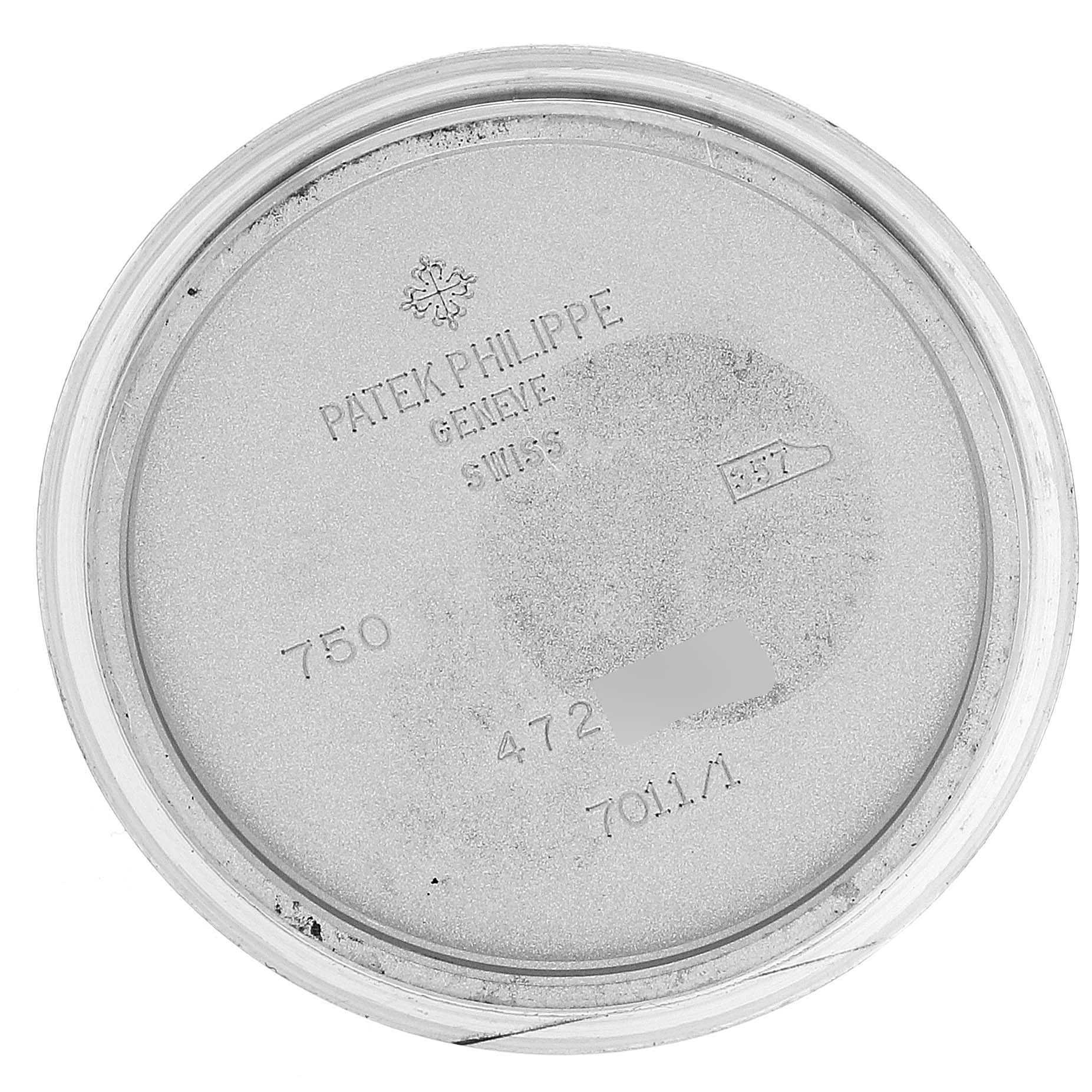 The image shows the inner caseback of a Patek Philippe Nautilus 7011/1G-001 Women's White Gold Silver Dial 7011/1G-001 Women's White Gold Silver Dial model watch.