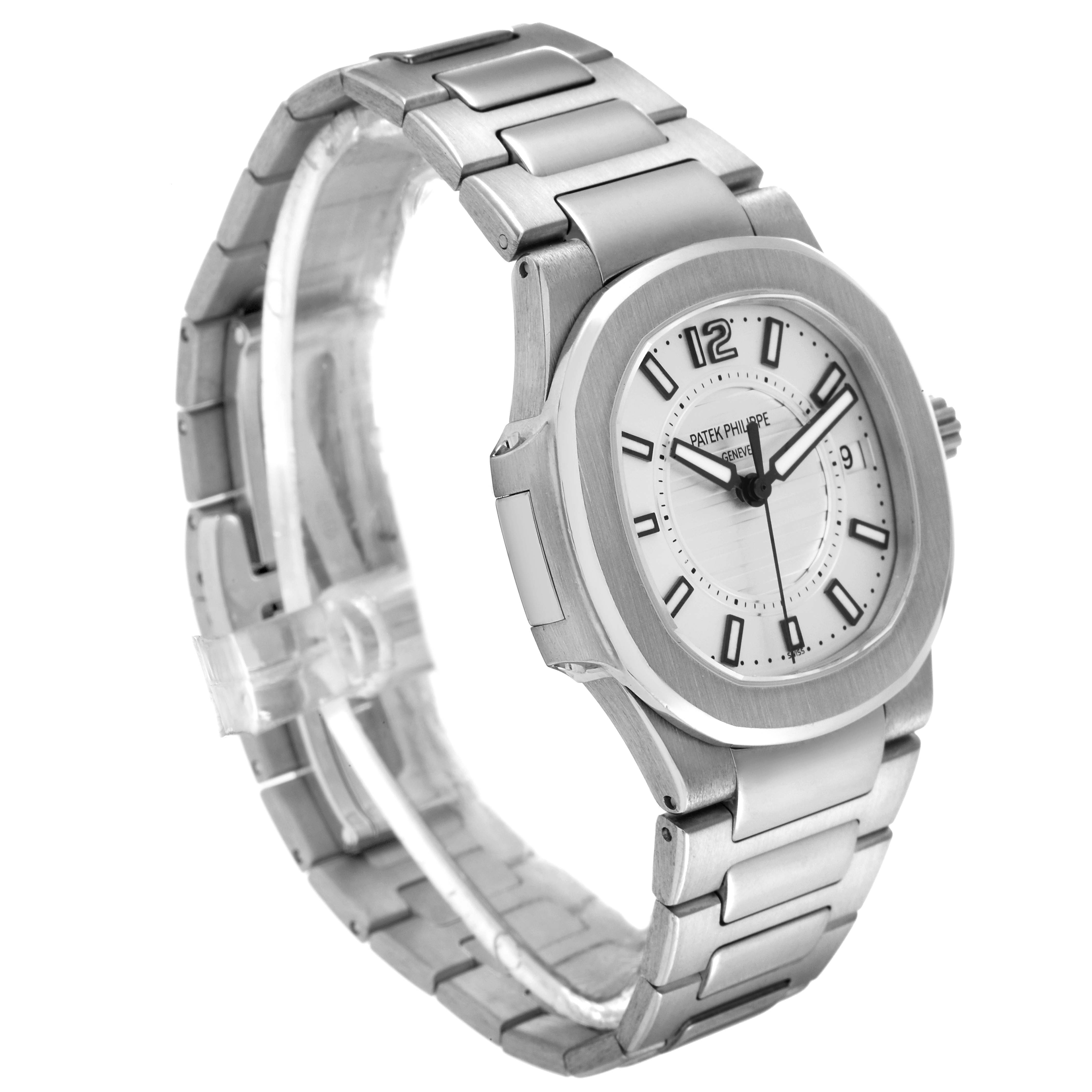 The image shows a Patek Philippe Nautilus 7011/1G-001 Women's White Gold Silver Dial 7011/1G-001 Women's White Gold Silver Dial watch at a three-quarter angle, displaying the face and stainless steel bracelet.