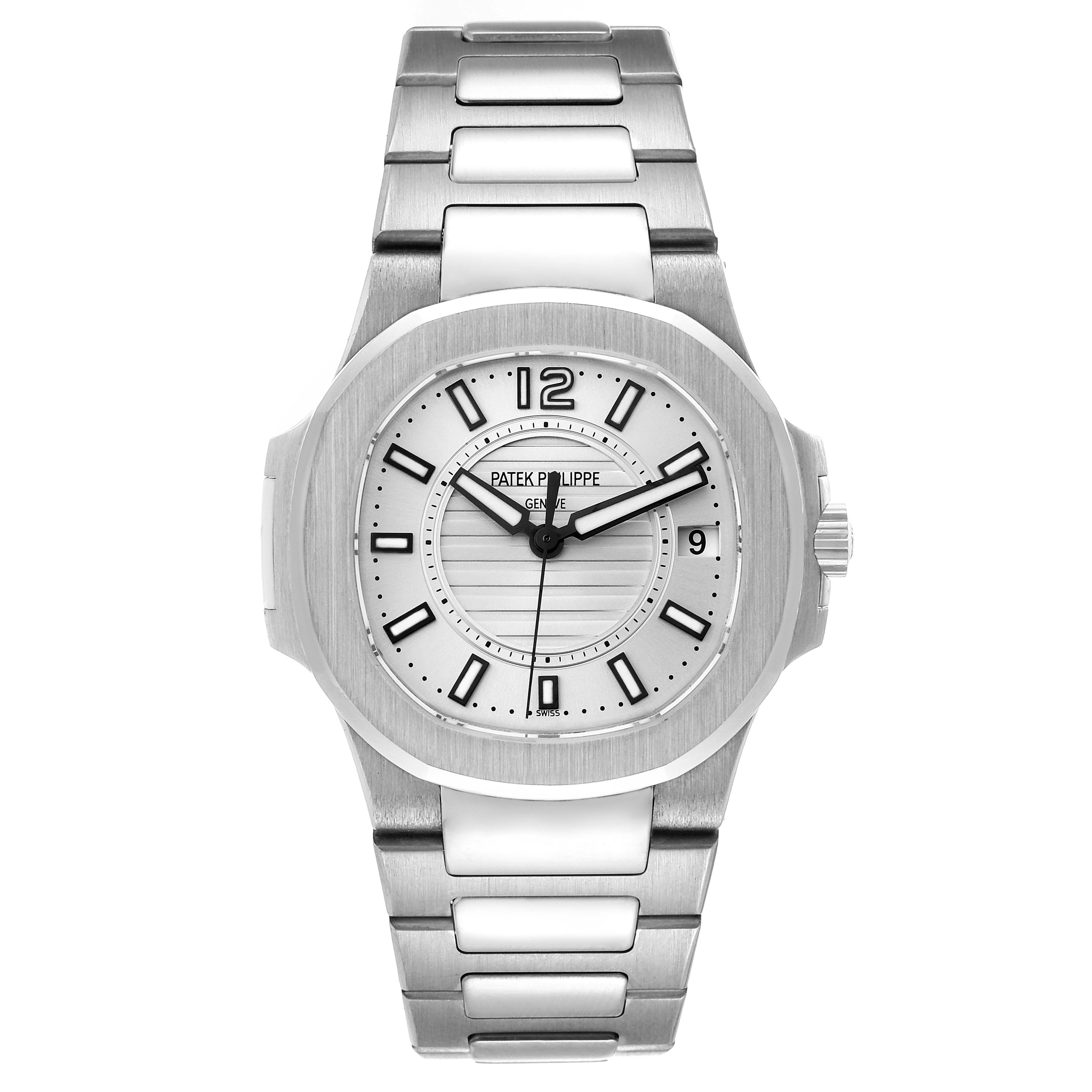 This is a front view of a Patek Philippe Nautilus 7011/1G-001 Women's White Gold Silver Dial 7011/1G-001 Women's White Gold Silver Dial watch, showing the dial, bracelet, and clasp.