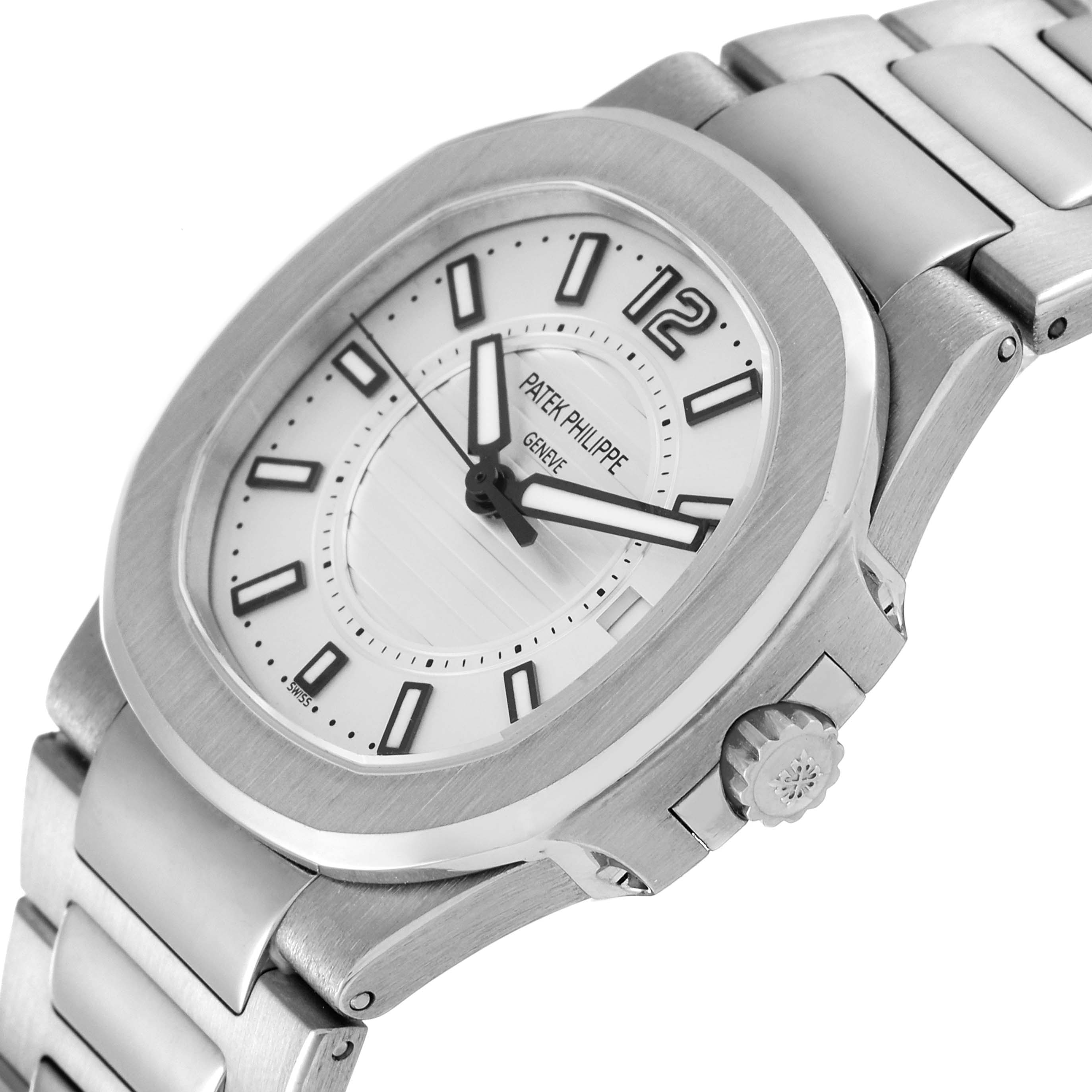 The Patek Philippe Nautilus 7011/1G-001 Women's White Gold Silver Dial 7011/1G-001 Women's White Gold Silver Dial watch is shown from a three-quarter angle, highlighting its face, crown, and part of the bracelet.