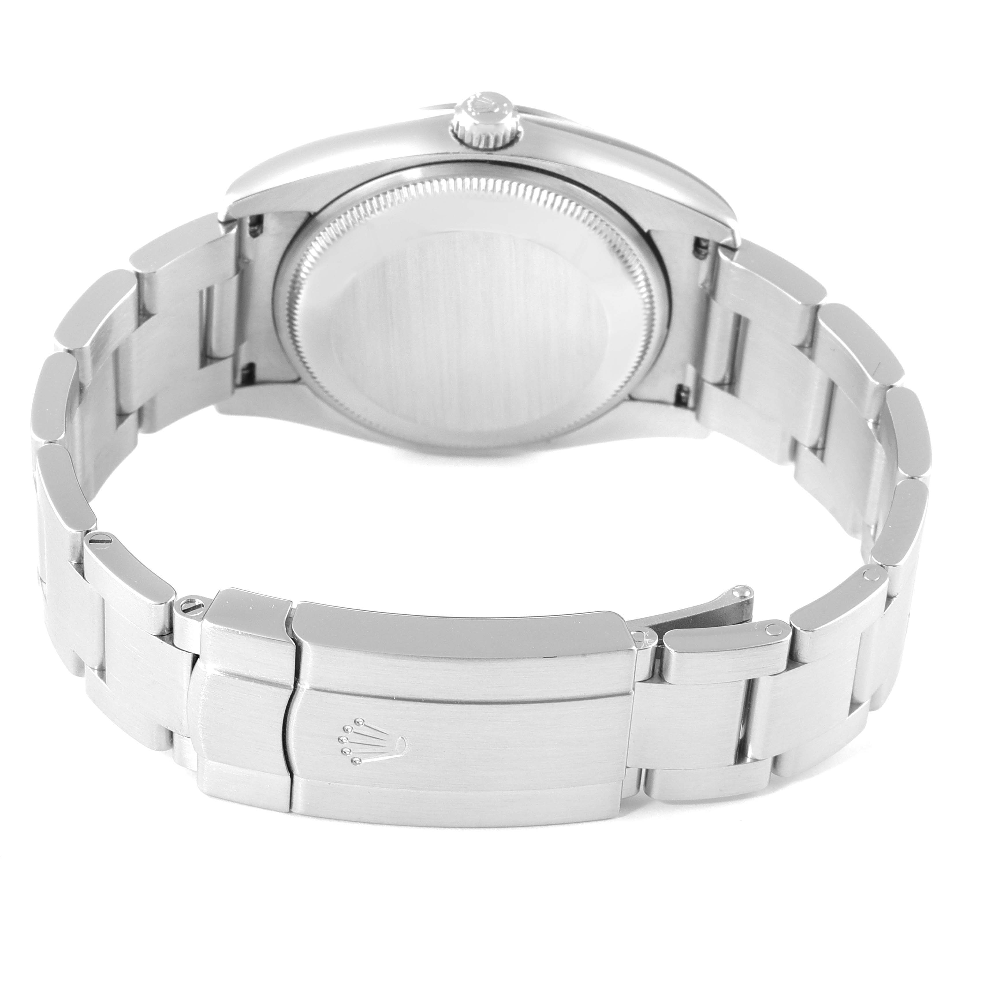 The image shows the back view of a Rolex Air-King 114210 Men's Stainless Steel Blue Dial 114210 Men's Stainless Steel Blue Dial wristwatch, highlighting its bracelet and clasp.