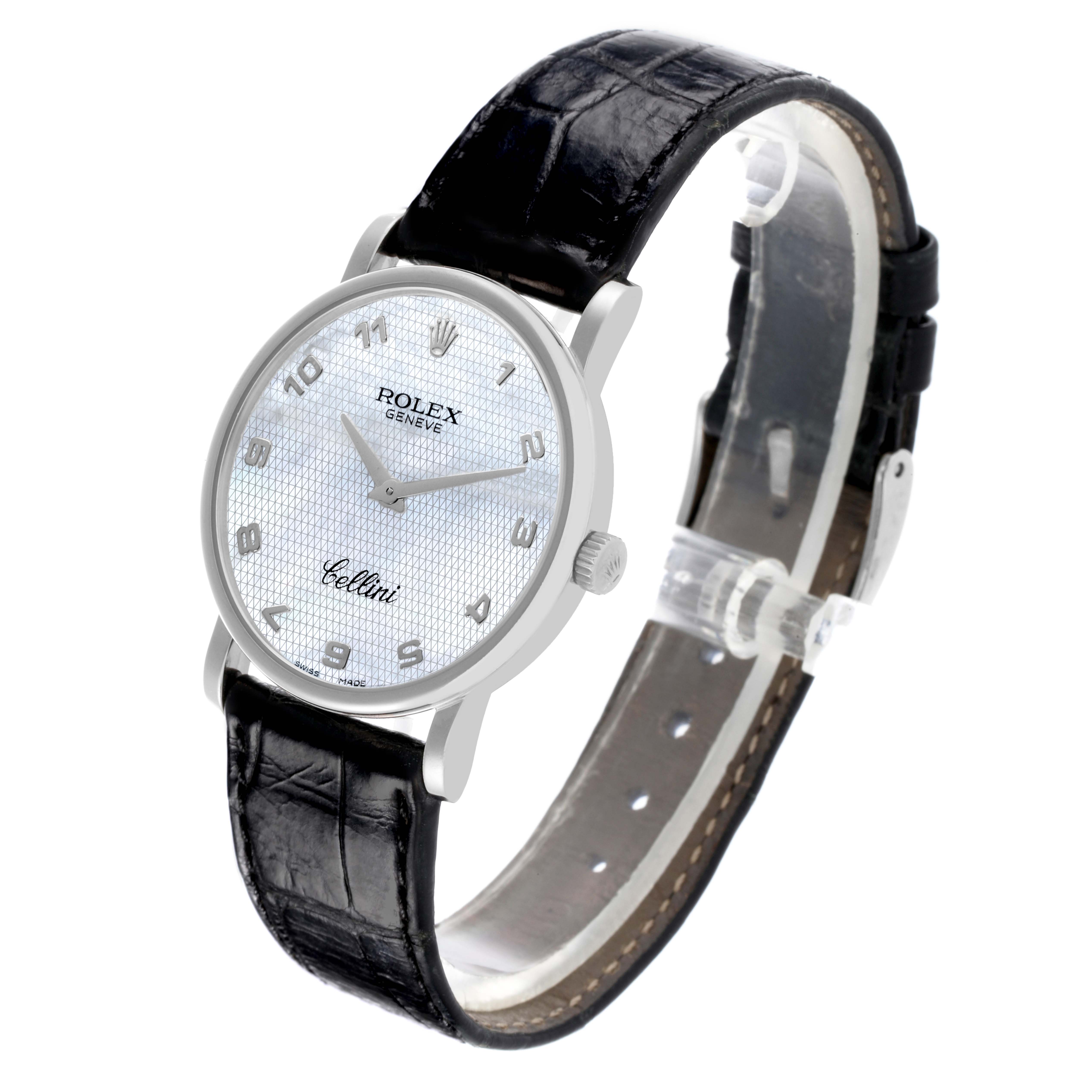 The Rolex Cellini 5115 Men's White Gold Mother of Pearl Dial 5115 Men's White Gold Mother of Pearl Dial watch is shown at a front angle, displaying the dial, case, and partially open black leather strap.