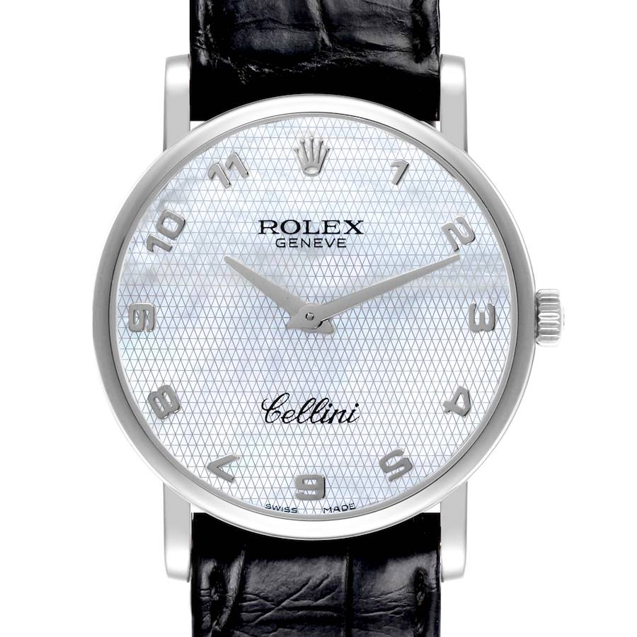 The Rolex Cellini watch is shown from the front, displaying the dial, hands, and part of the leather strap.