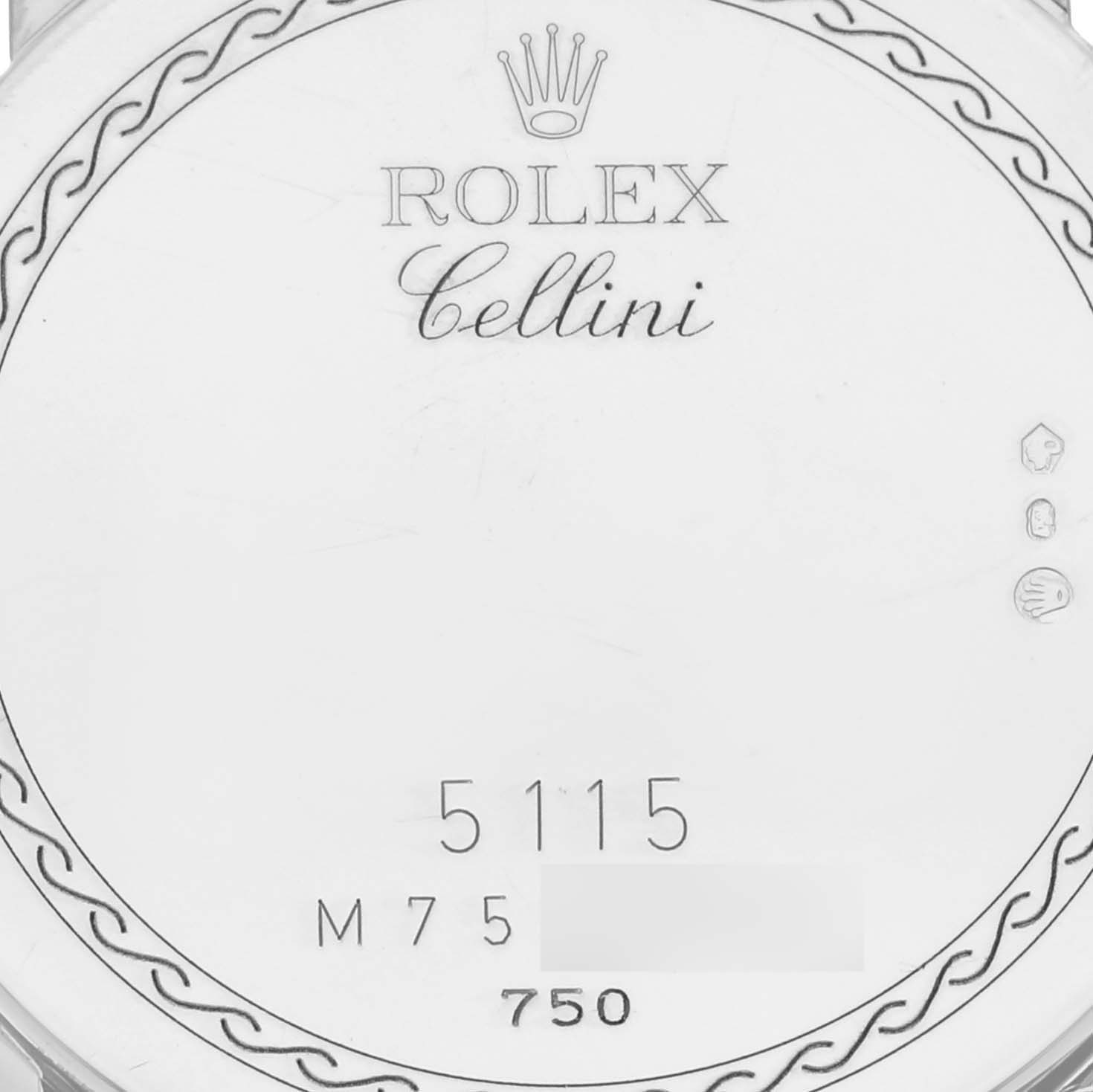 This image shows the case back detail of a Rolex Cellini 5115 Men's White Gold Mother of Pearl Dial 5115 Men's White Gold Mother of Pearl Dial watch, focusing on engravings and hallmarks.