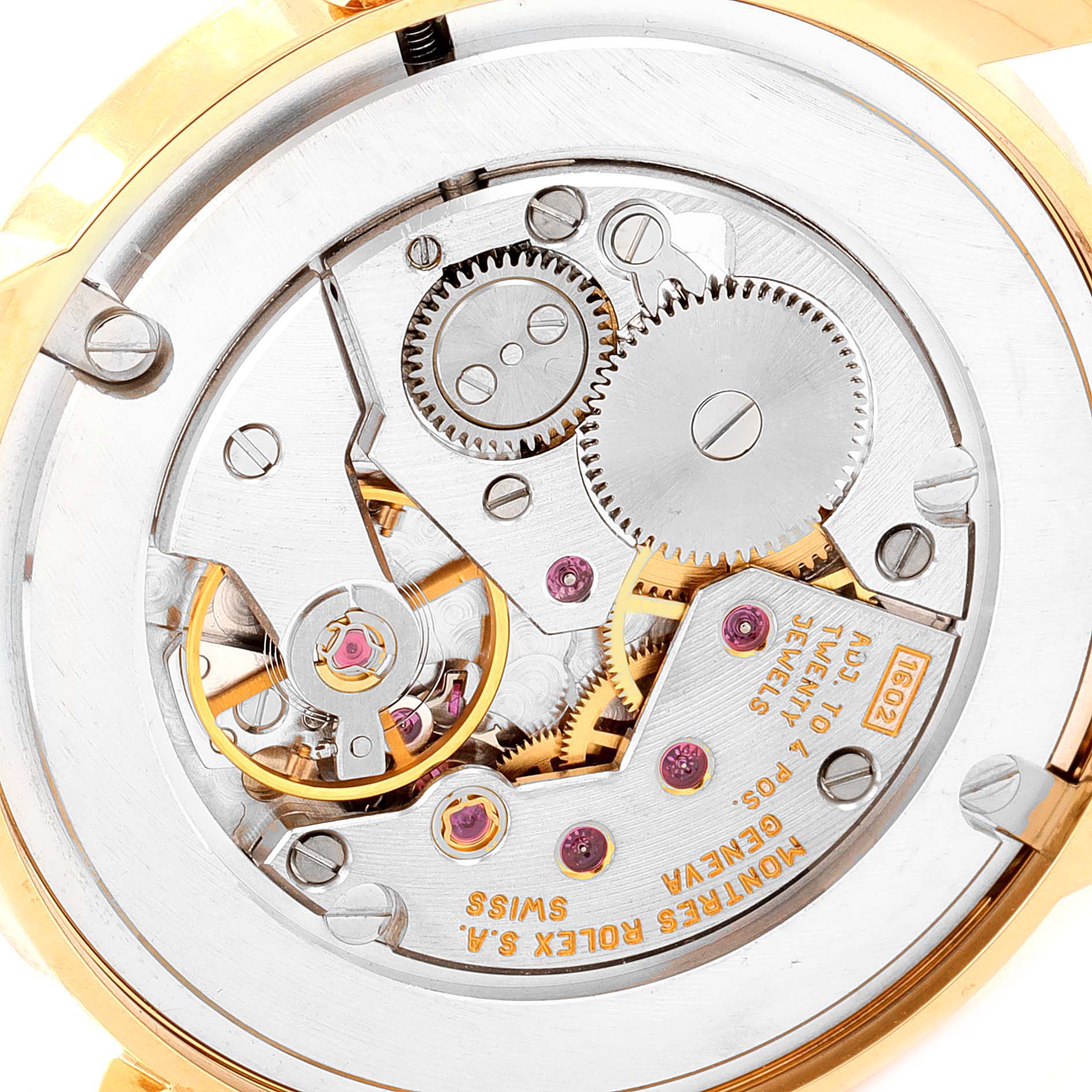 This image shows a close-up view of the movement and inner mechanics of a Rolex Cellini 5116/8 Men's Yellow Gold Beige Dial 5116/8 Men's Yellow Gold Beige Dial watch.