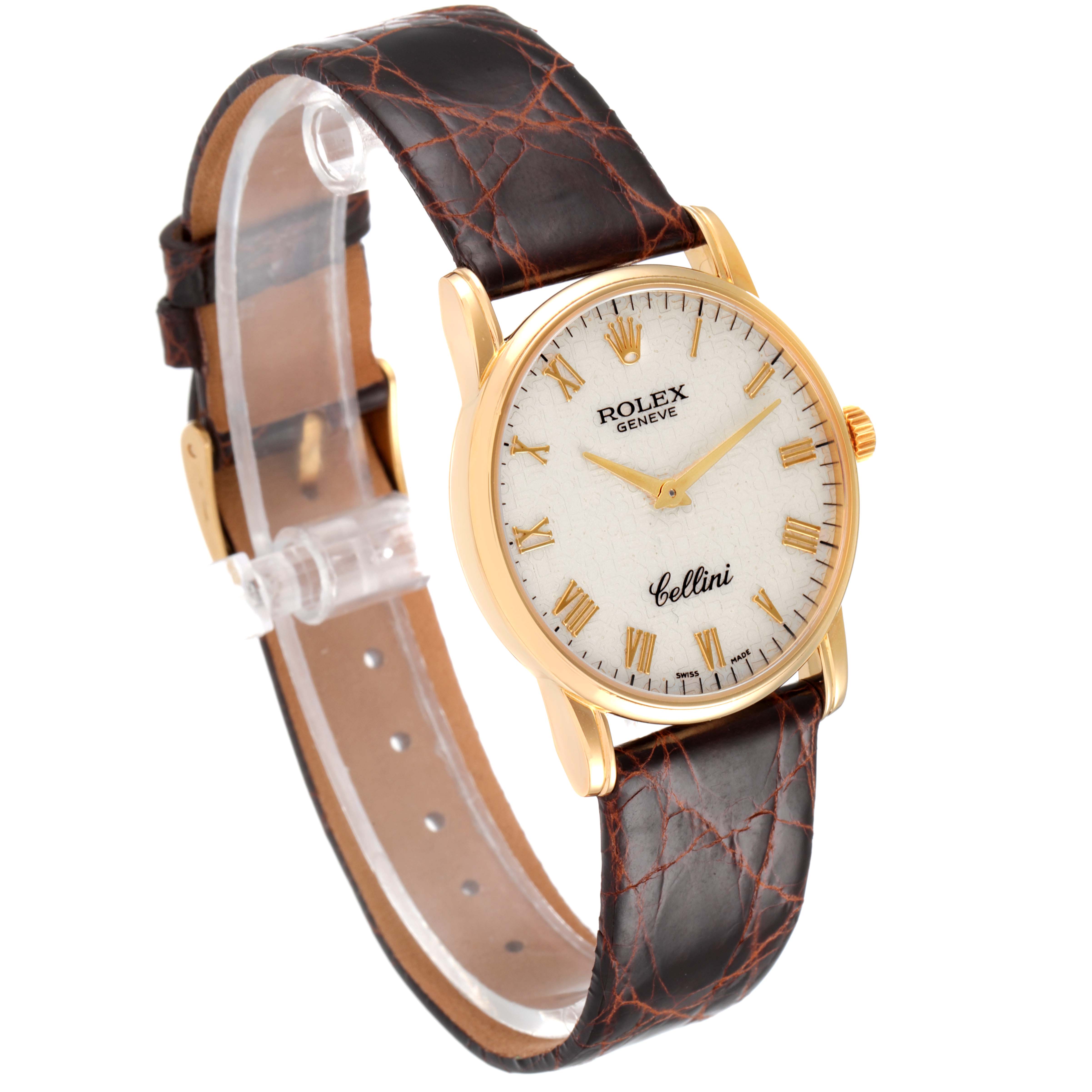 This image shows a Rolex Cellini 5116/8 Men's Yellow Gold Beige Dial 5116/8 Men's Yellow Gold Beige Dial watch from an angled side view, highlighting its brown leather strap and gold case.