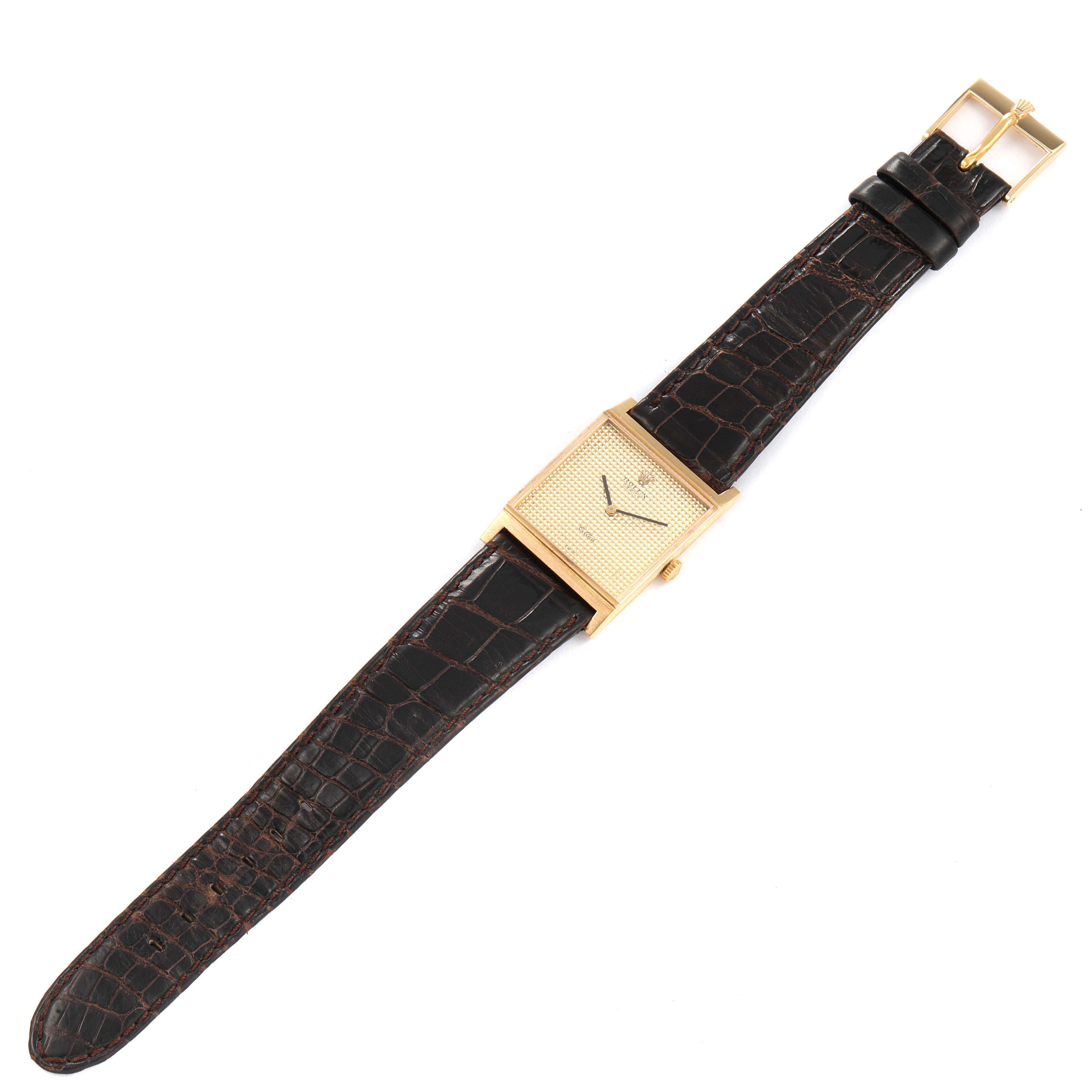 The image shows a Rolex Cellini 4312 Men's Yellow Gold Champagne Dial 4312 Men's Yellow Gold Champagne Dial model watch from an overhead angle, displaying its rectangular face and brown leather strap.