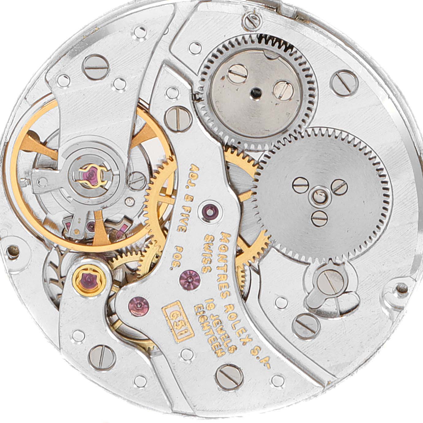 This is a close-up view of the inner mechanical components of a Rolex Cellini 4312 Men's Yellow Gold Champagne Dial 4312 Men's Yellow Gold Champagne Dial watch movement.