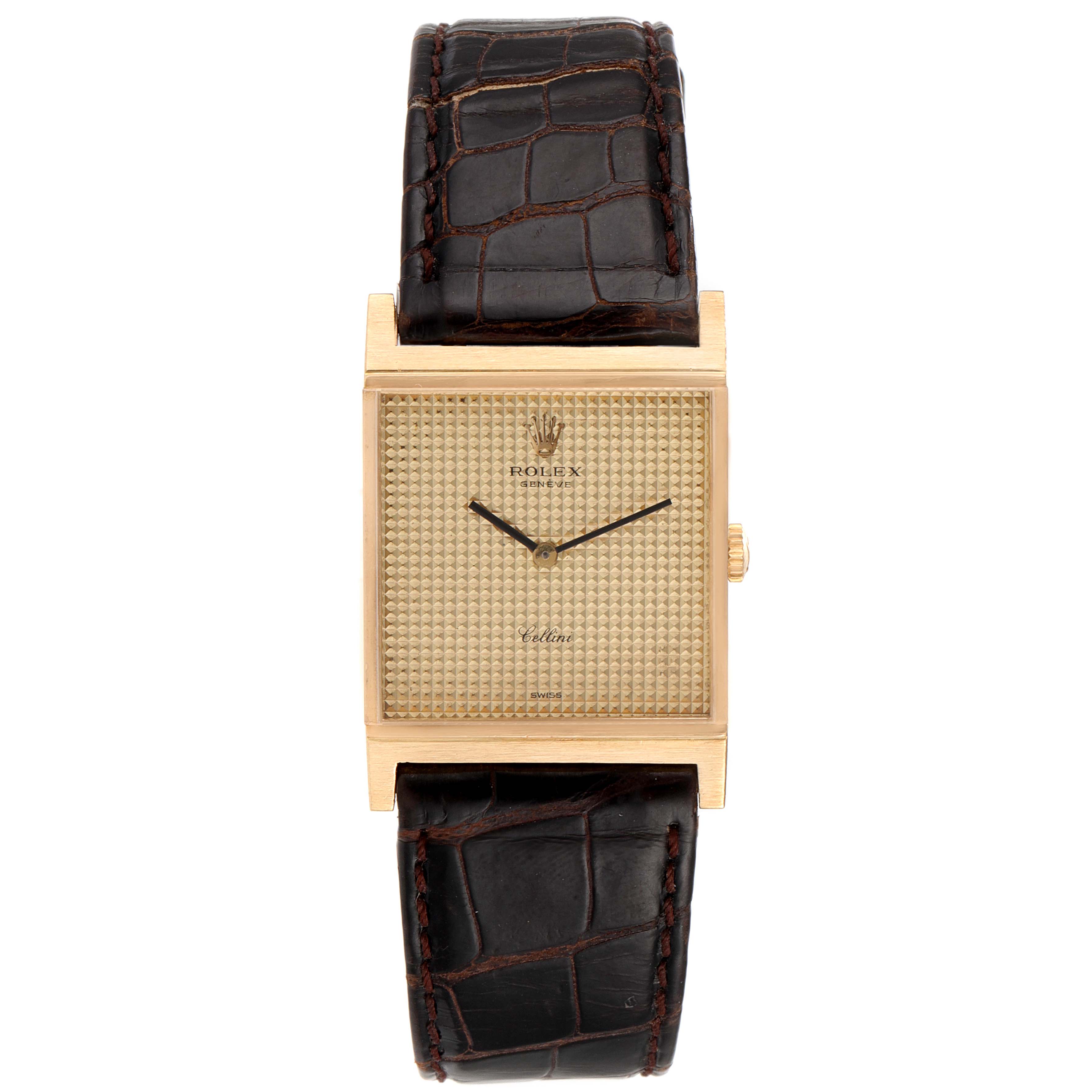 The image shows the Rolex Cellini 4312 Men's Yellow Gold Champagne Dial 4312 Men's Yellow Gold Champagne Dial watch from a front angle, displaying its rectangular face, gold dial, and black leather strap.