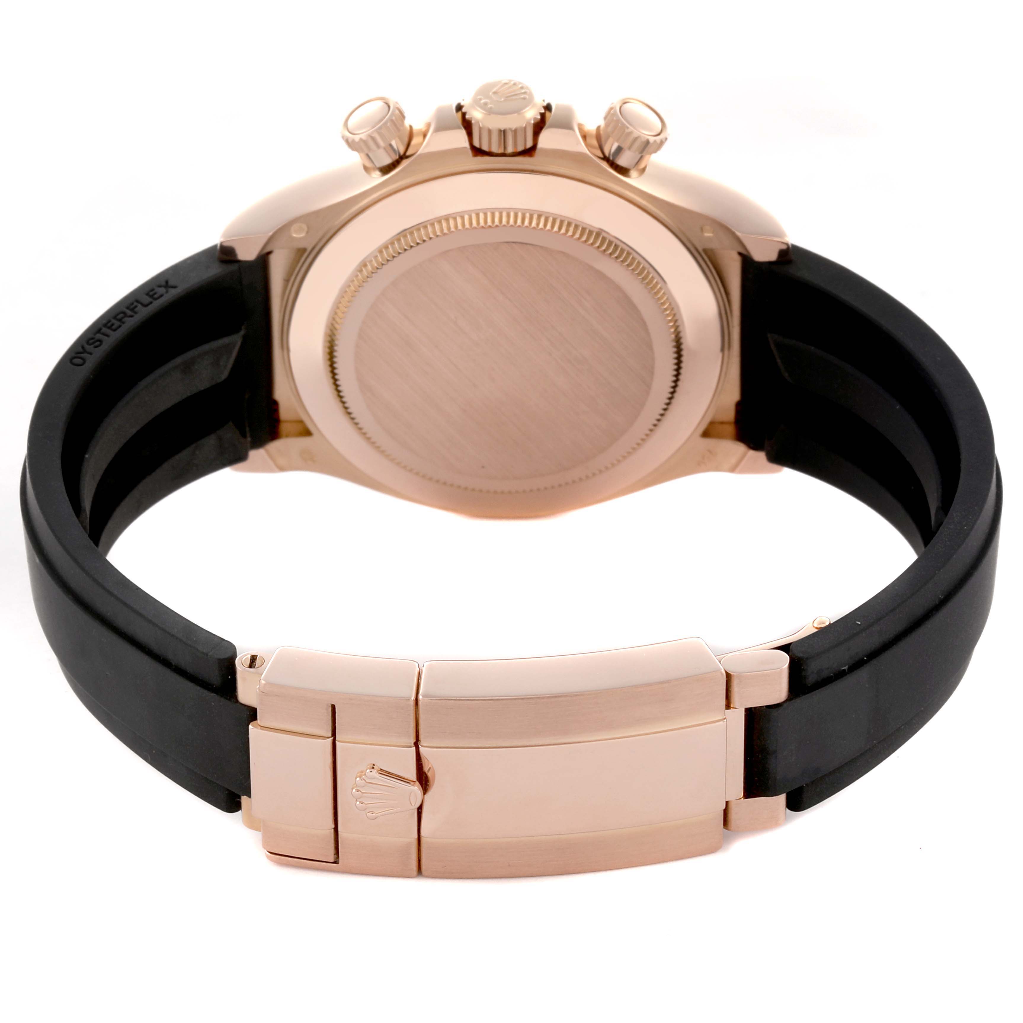 The image shows the back view of a Rolex Daytona 116515 Men's Rose Gold Brown Dial 116515 Men's Rose Gold Brown Dial, including the clasp, case back, and crown on an Oysterflex strap.