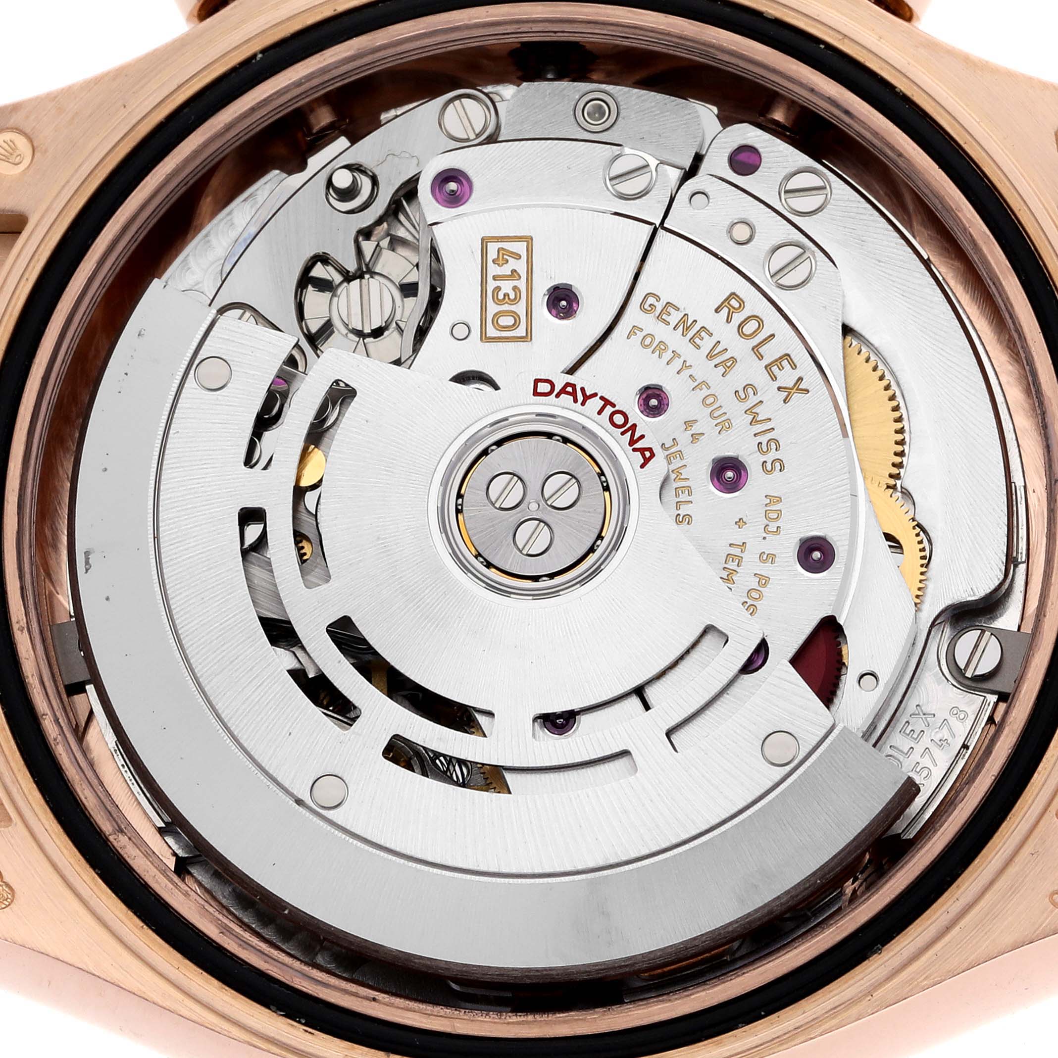 The image shows the movement and inner mechanisms of a Rolex Daytona 116515 Men's Rose Gold Brown Dial 116515 Men's Rose Gold Brown Dial watch from a back angle.
