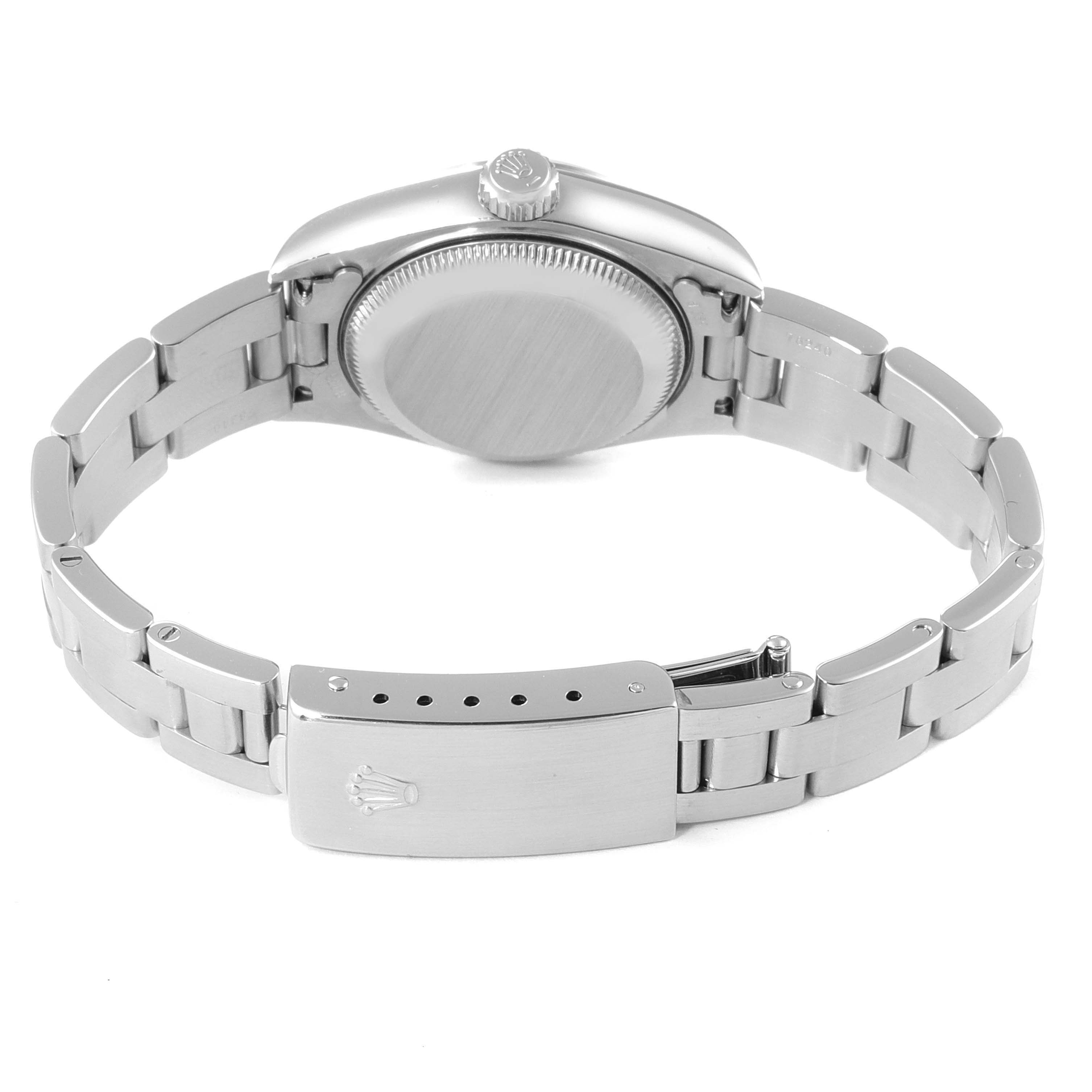 This image shows the back view of a Rolex Date 79160 Women's Stainless Steel White Dial 79160 Women's Stainless Steel White Dial model watch, highlighting the case, crown, and clasp of the metal bracelet.