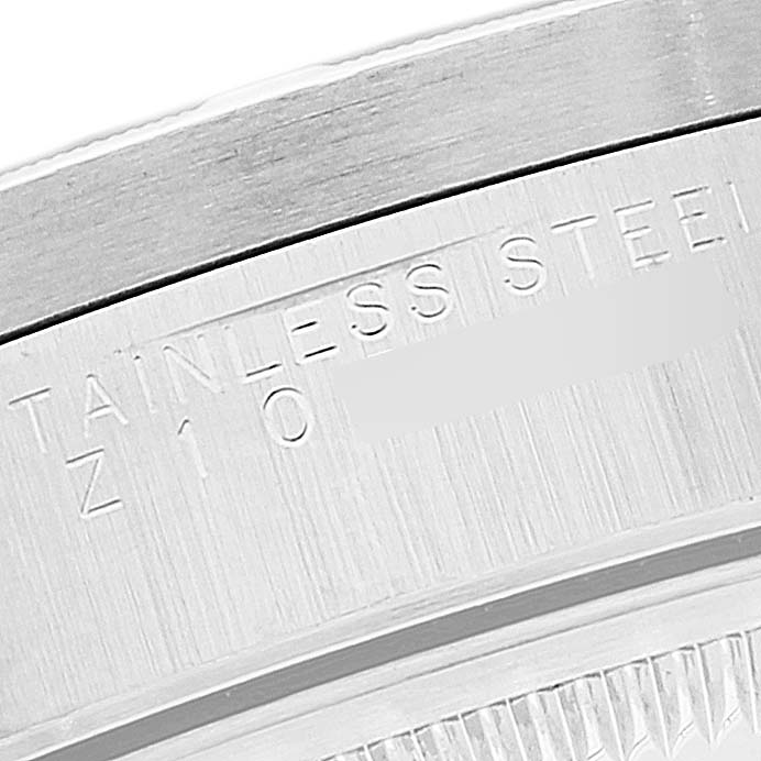 This close-up image shows the stainless steel case and part of the bezel of the Rolex Date 15210 Men's Stainless Steel Black Dial 15210 Men's Stainless Steel Black Dial model.