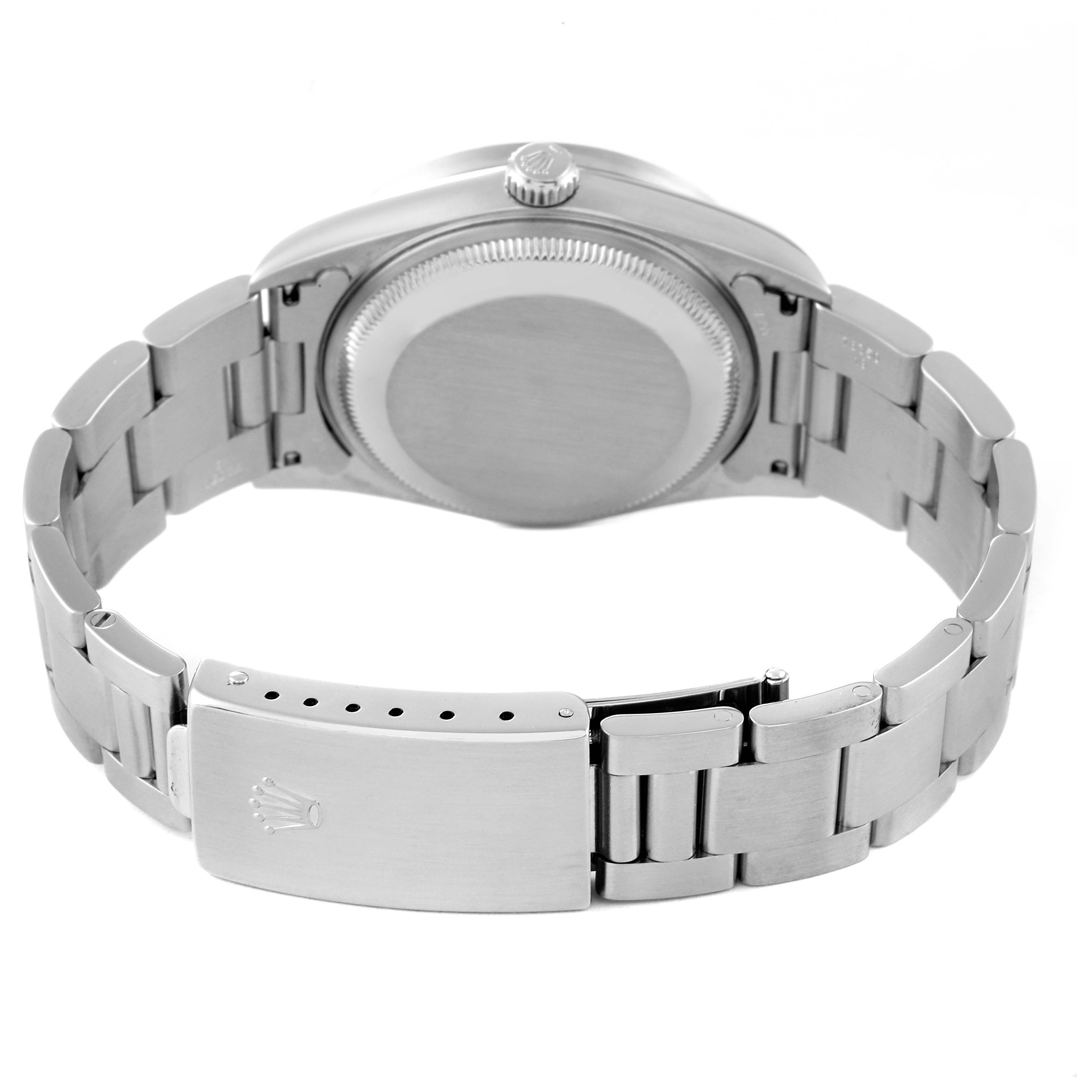 This image shows the back side of the Rolex Date 15210 Men's Stainless Steel Black Dial 15210 Men's Stainless Steel Black Dial model watch, featuring its bracelet and clasp.