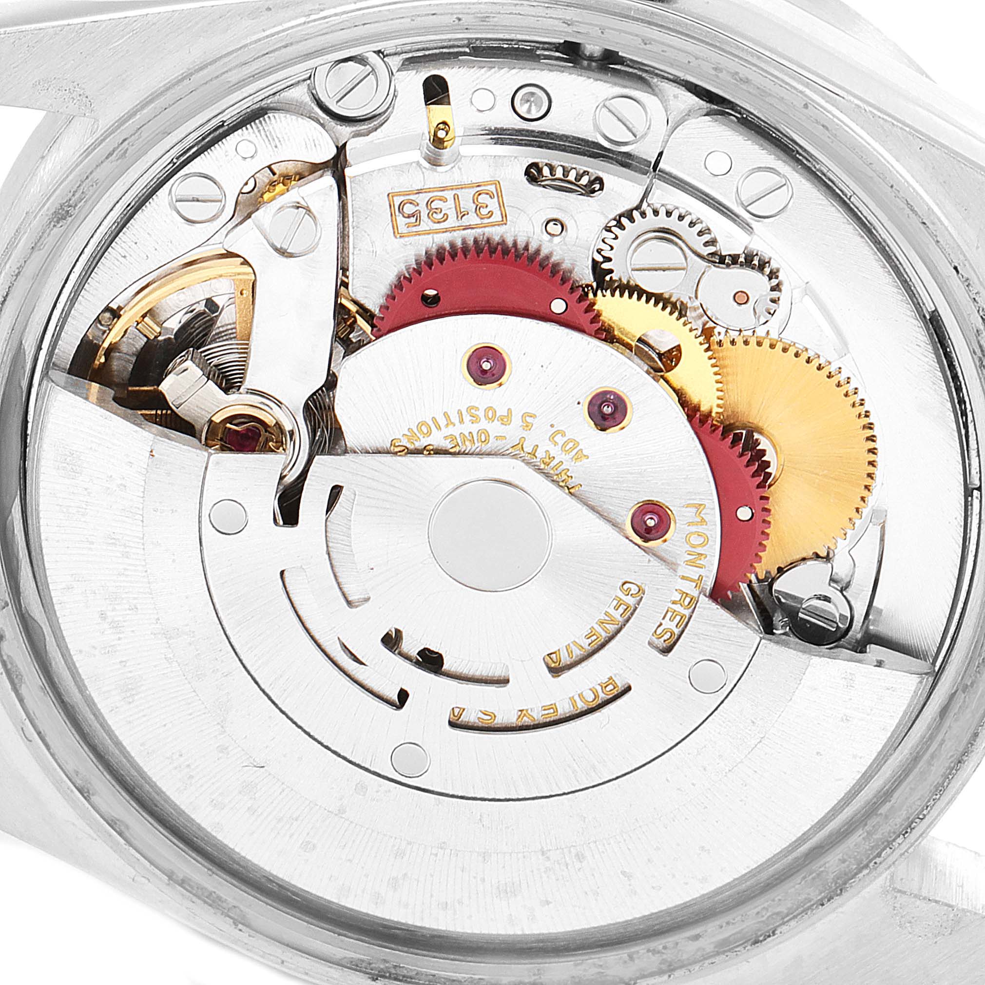 The image shows a close-up view of the movement and internal components of a Rolex Date 15210 Men's Stainless Steel Silver Dial 15210 Men's Stainless Steel Silver Dial watch.