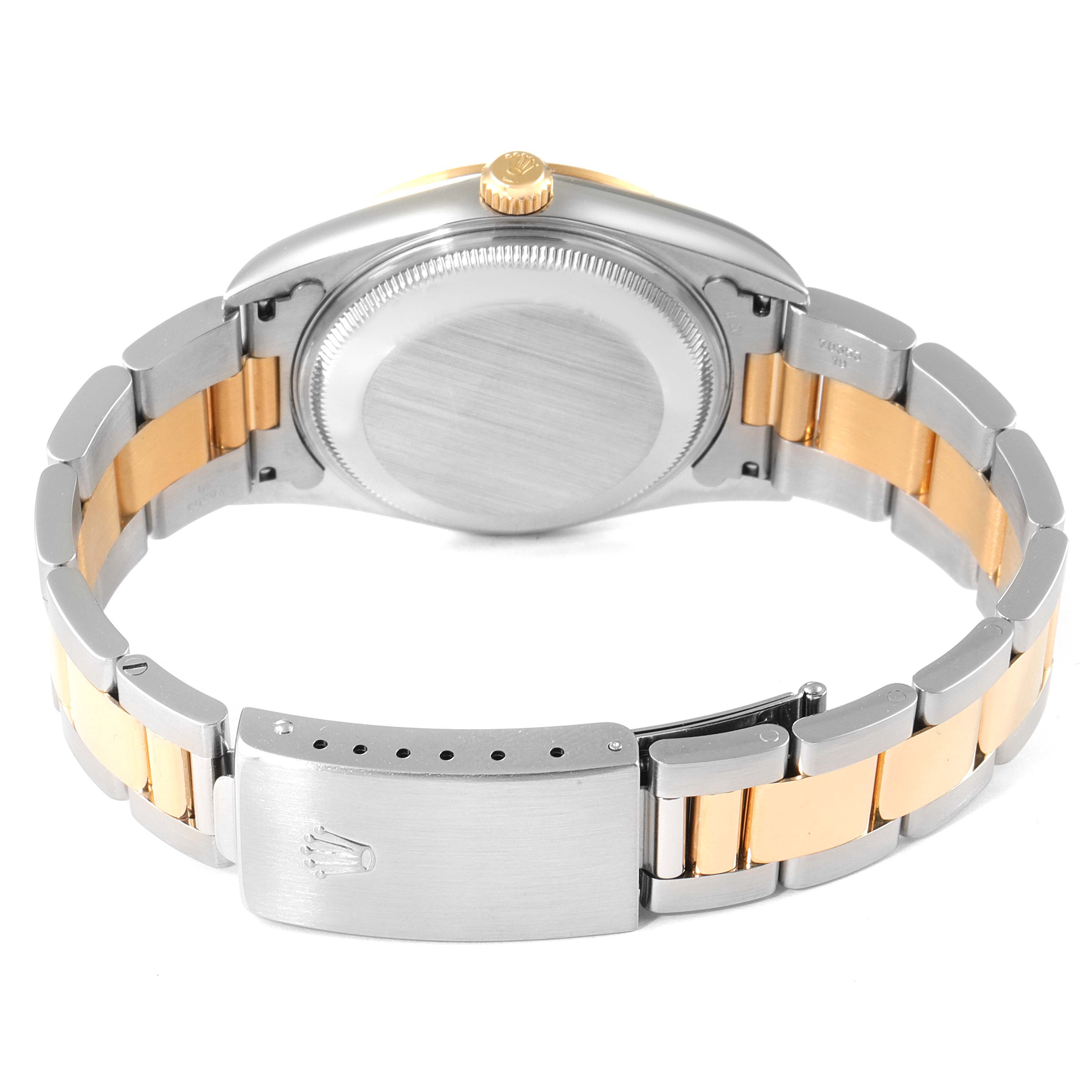 This image shows the back view of the Rolex Date 15203 Men's Steel and Gold (two tone) Black Dial 15203 Men's Steel and Gold (two tone) Black Dial model watch, including the case back and stainless steel and gold bracelet.