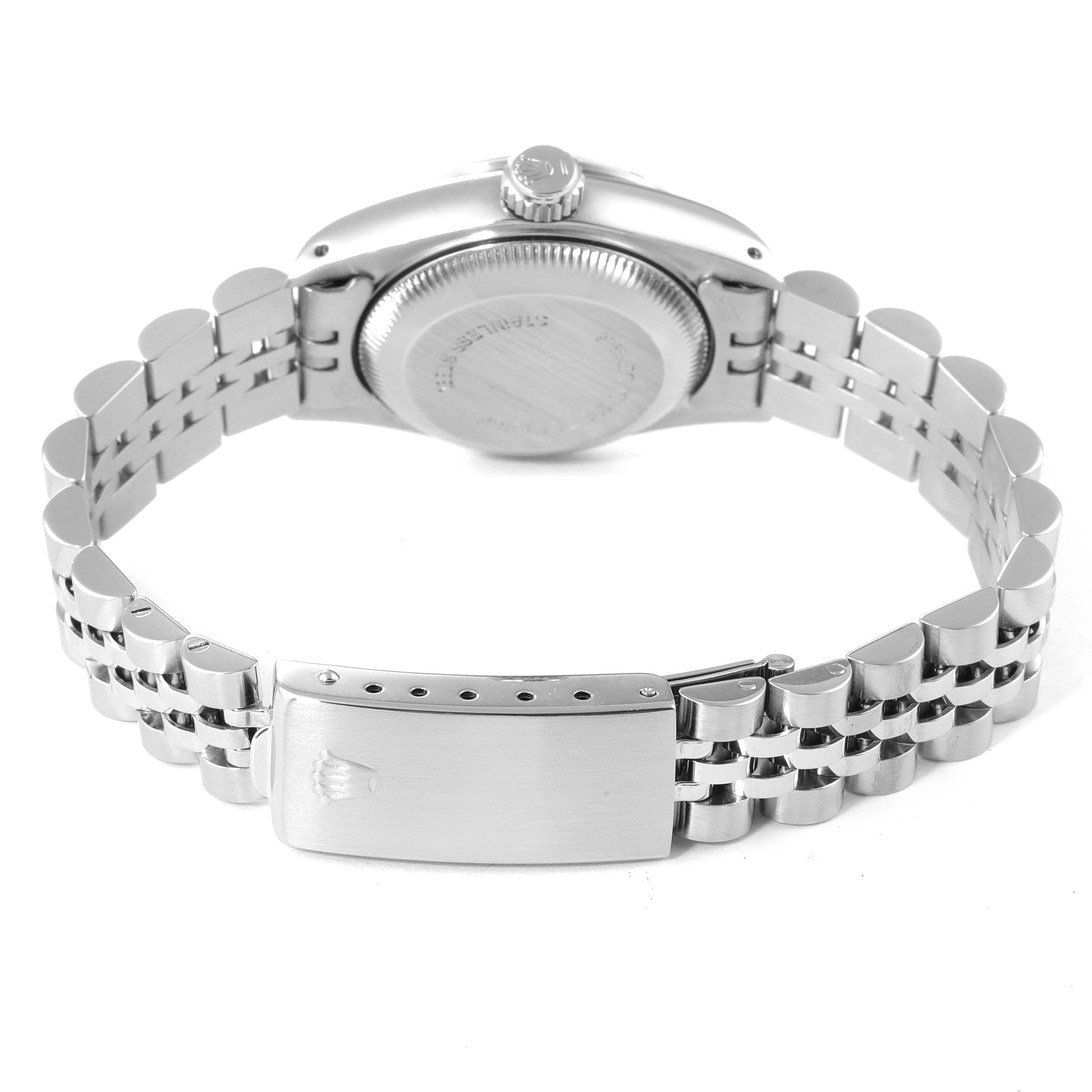 The image shows the back of a Rolex Date 69160 Women
s Stainless Steel White Dial 69160 Women
s Stainless Steel White Dial watch, including the case back and the bracelet clasp.