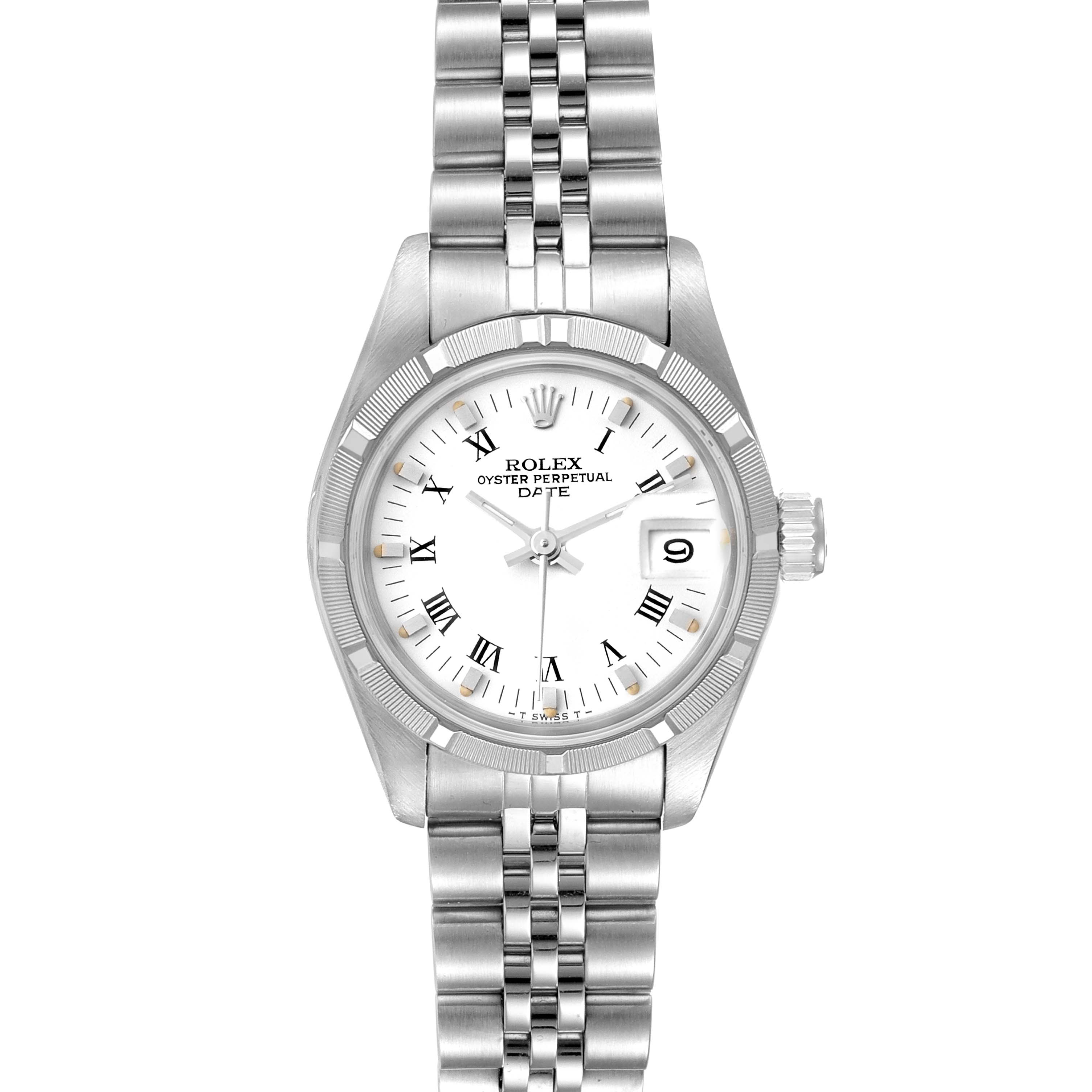 This image shows a Rolex Date 69160 Women
s Stainless Steel White Dial 69160 Women
s Stainless Steel White Dial model watch from a top-down angle, highlighting its dial, bezel, and bracelet.