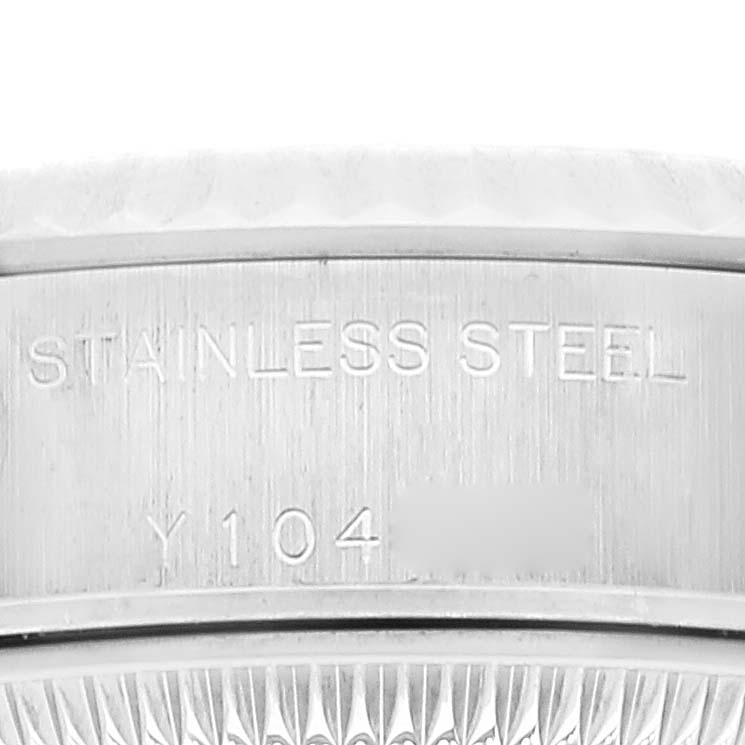 This close-up image shows the side engraving on a stainless steel Rolex Datejust 79174 Women's Stainless Steel Silver Dial 79174 Women's Stainless Steel Silver Dial watch.