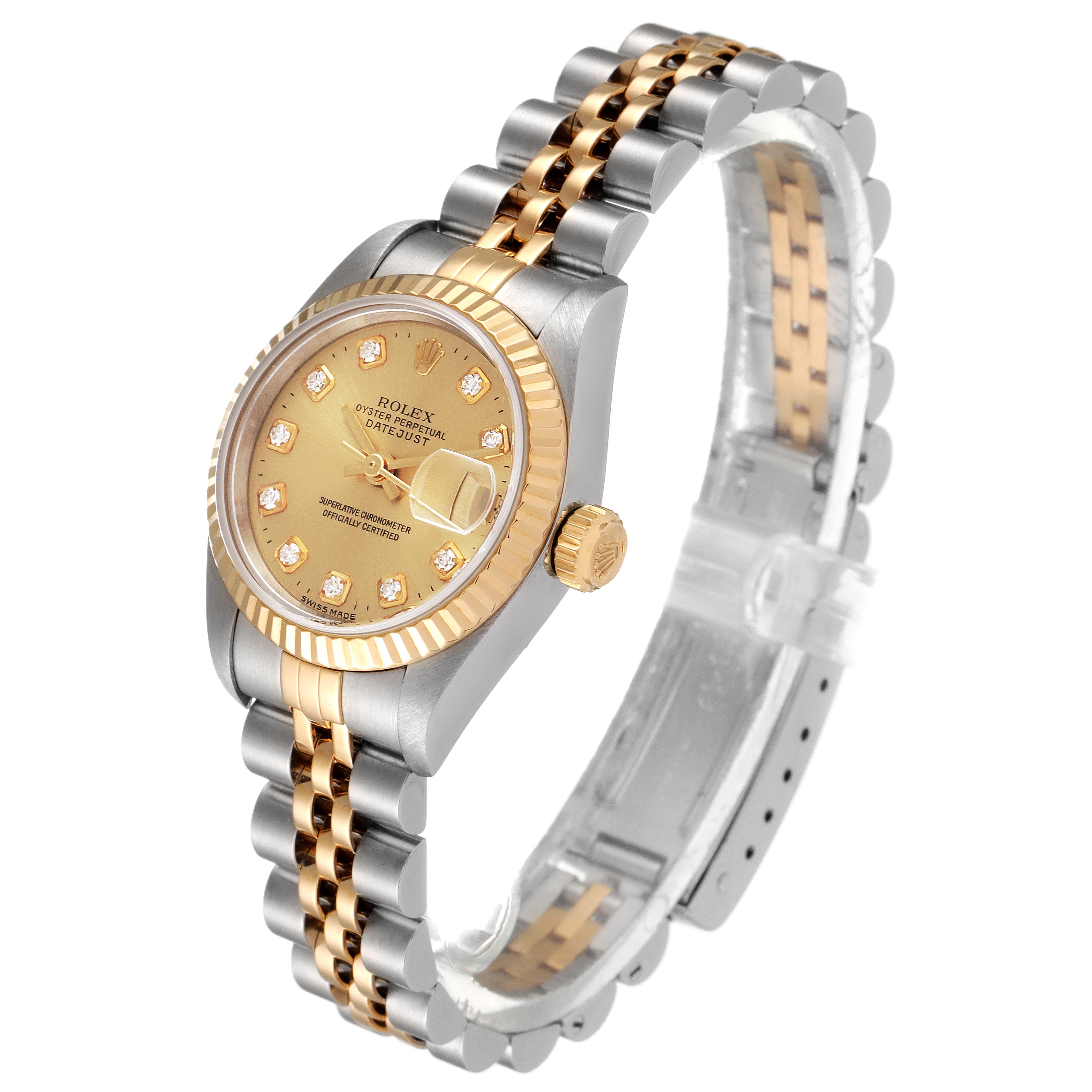 The image shows a Rolex Datejust 69173 Women's Steel and Gold (two tone) Champagne Dial 69173 Women's Steel and Gold (two tone) Champagne Dial watch at a three-quarter angle, highlighting its gold and silver bracelet, bezel, crown, and dial.