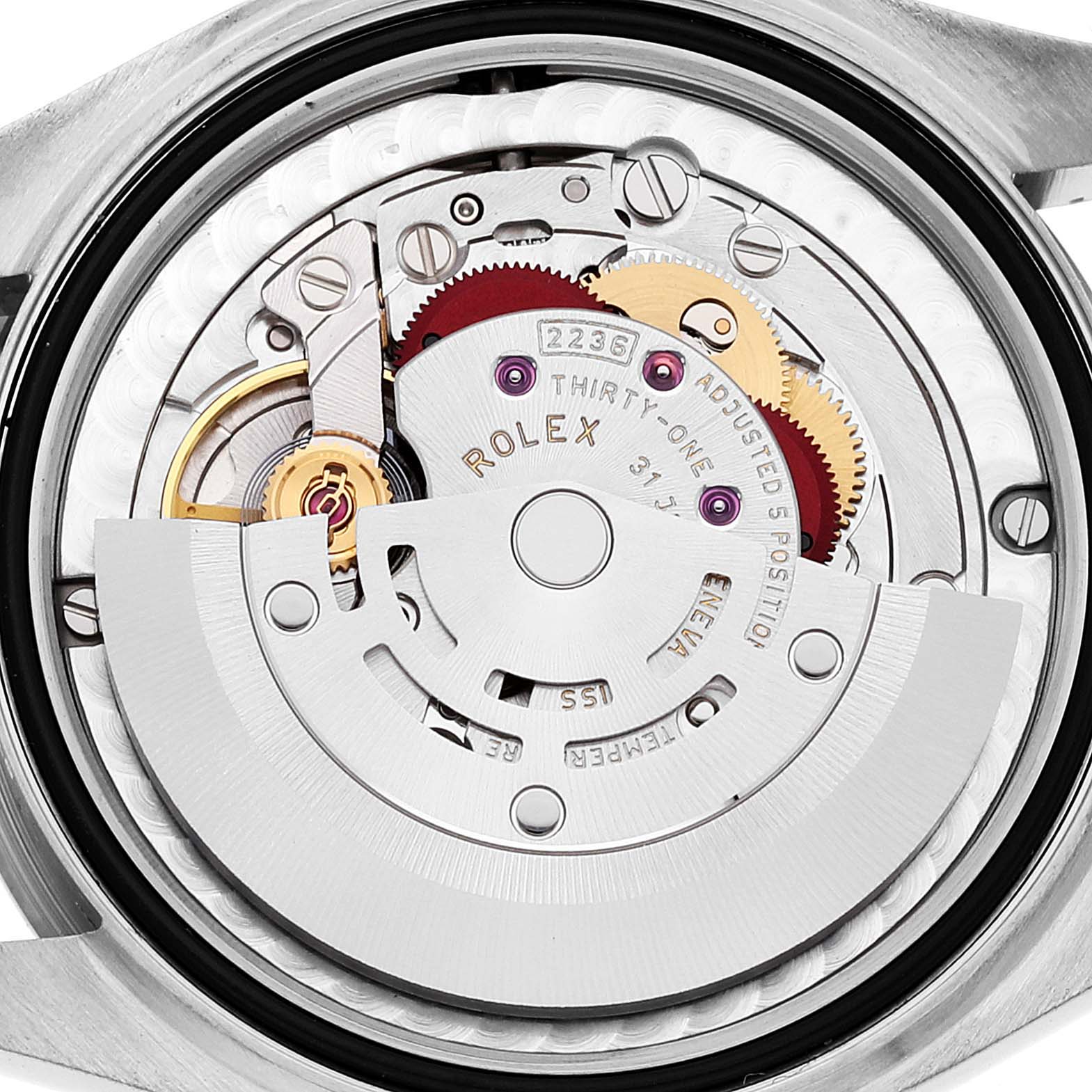 The image shows the back view of the Rolex Mid-Size 278274 Women's Stainless Steel Silver Dial 278274 Women's Stainless Steel Silver Dial watch, highlighting its intricate movement and internal mechanisms.