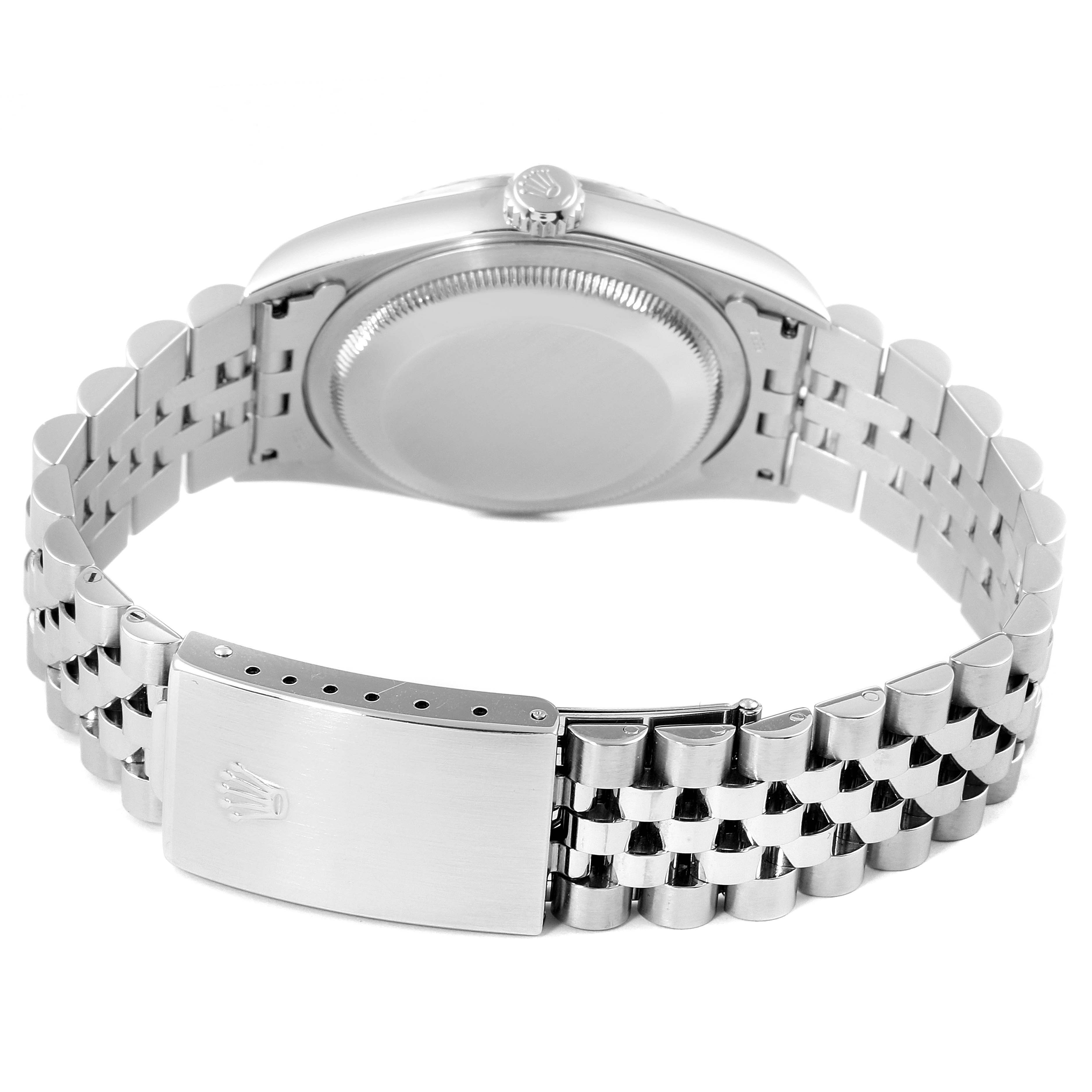 The image shows the back view of a Rolex Datejust 16234 Men's Stainless Steel Blue Dial 16234 Men's Stainless Steel Blue Dial watch, focusing on the case back and bracelet with a clasp.