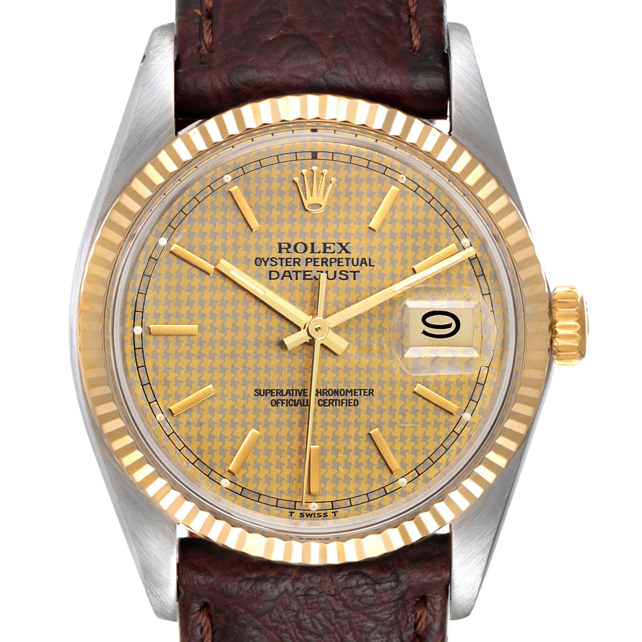 The image shows a front view of a Rolex Vintage Collection 16013 Men's Steel and Gold (two tone) Champagne Dial 16013 Men's Steel and Gold (two tone) Champagne Dial model Datejust watch, displaying its face, bezel, and part of the leather strap.